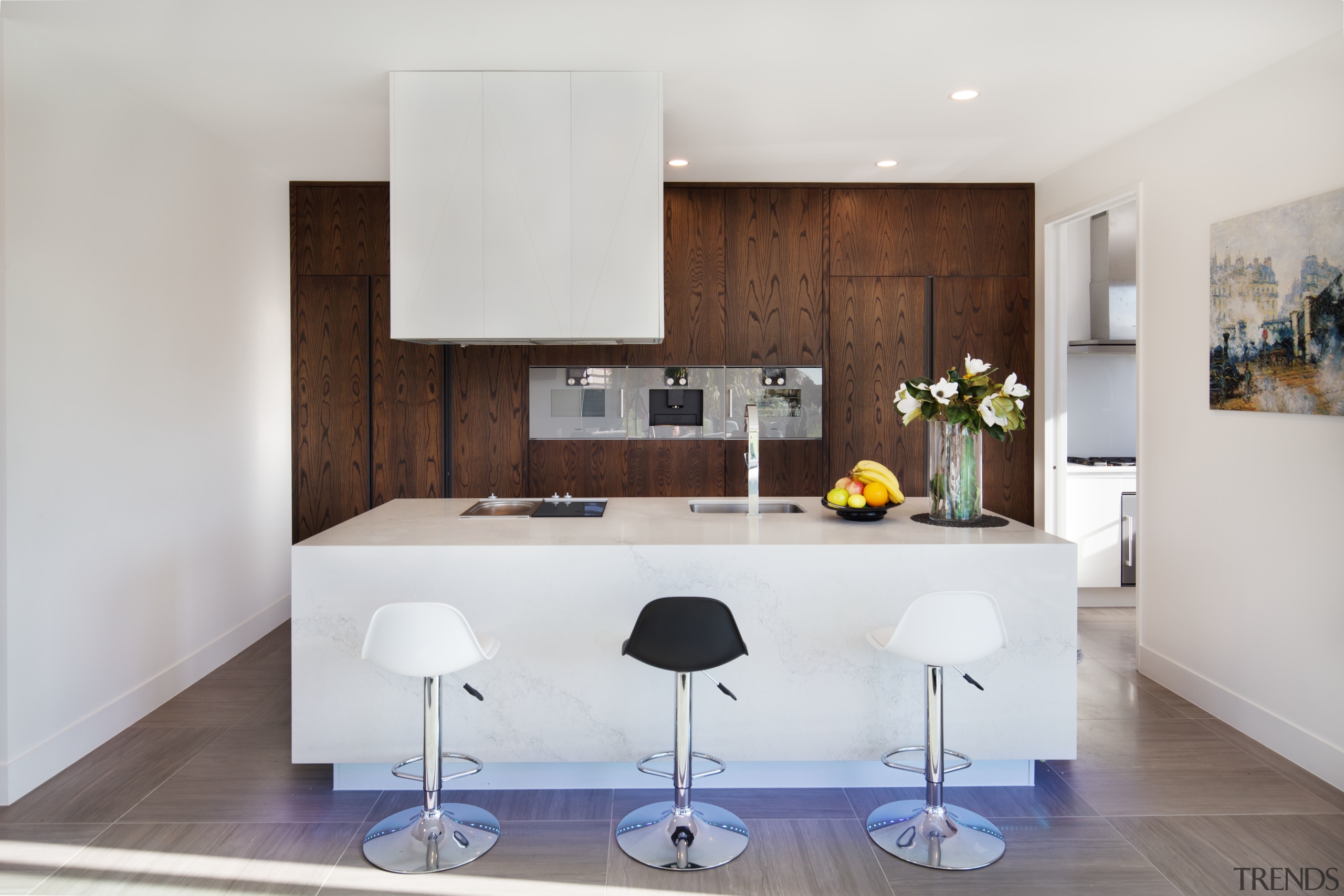 This kitchen in a home by DreamHome Group architecture, countertop, floor, interior design, interior designer, kitchen, product design, real estate, room, gray