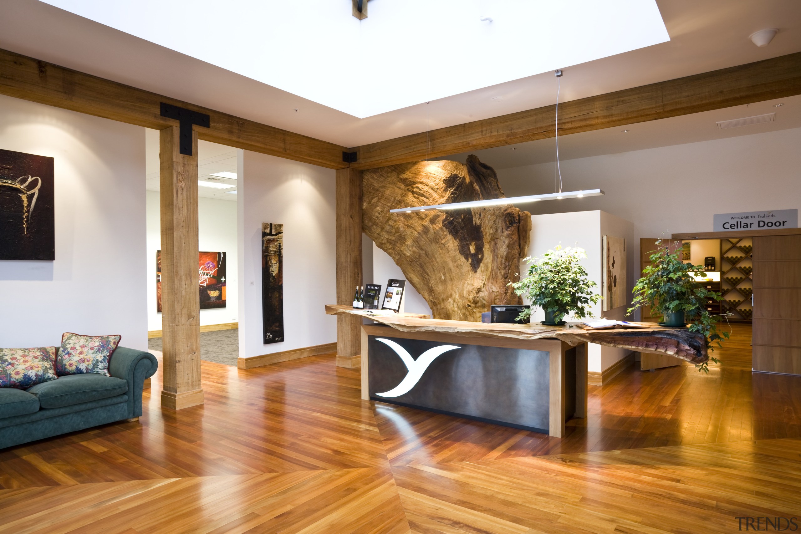 view of the reception area which features wooden ceiling, floor, flooring, hardwood, home, interior design, laminate flooring, living room, lobby, real estate, room, wood, wood flooring, brown, orange