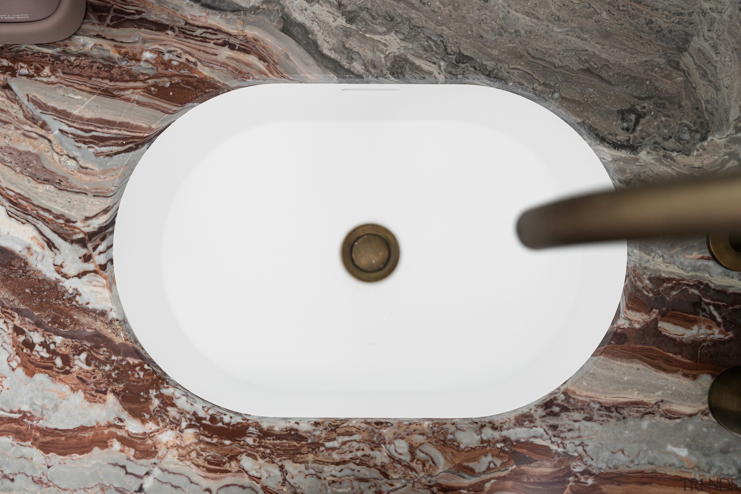 Looking down on the crisp white basin floating 