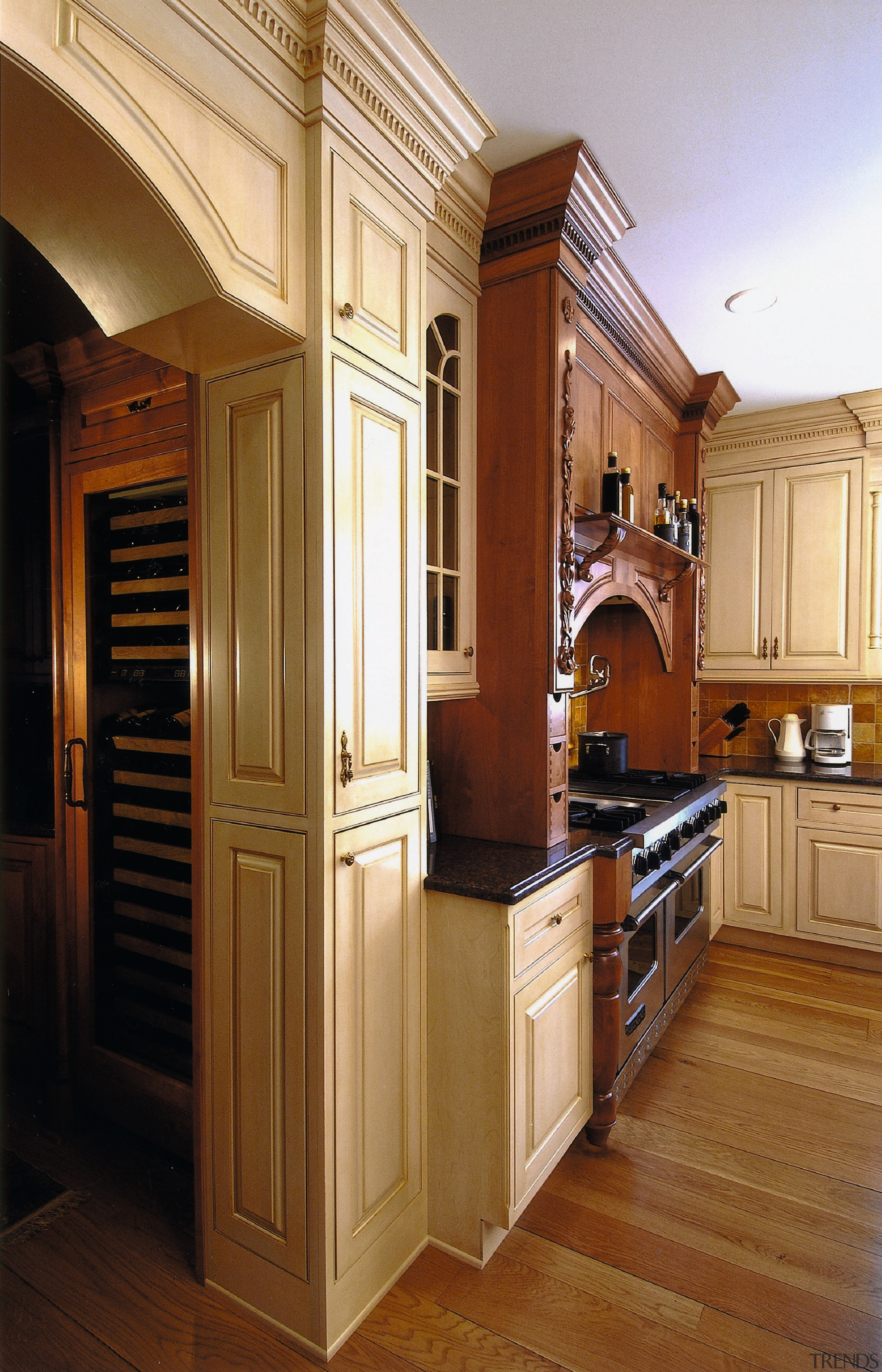View of the kitchen area - View of cabinetry, countertop, cuisine classique, flooring, furniture, hardwood, interior design, kitchen, room, wood flooring, wood stain, brown