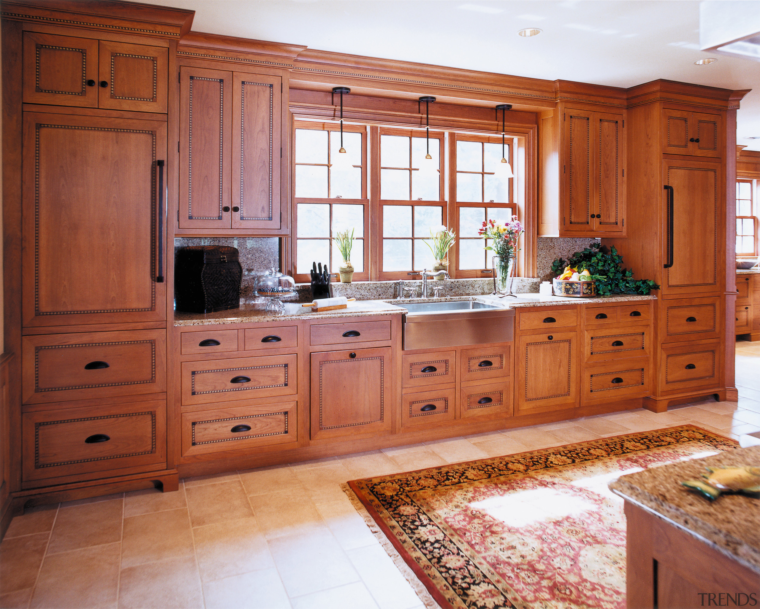 A view of a kitchen by Kitchen &amp; cabinetry, countertop, cuisine classique, floor, flooring, furniture, hardwood, home, interior design, kitchen, room, red