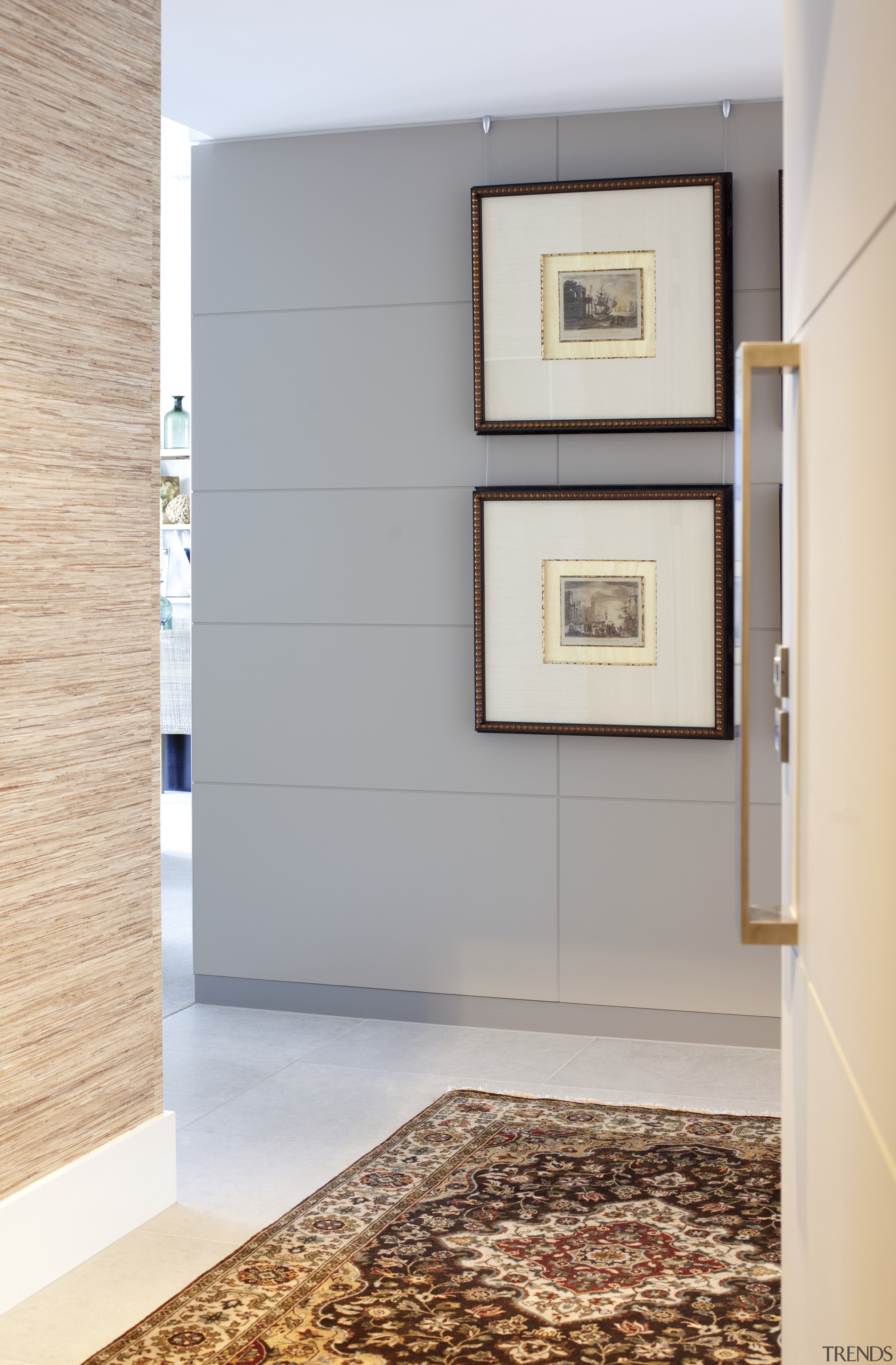 View of hallway with floor mat and wall floor, flooring, home, interior design, room, tile, wall, wood flooring, gray