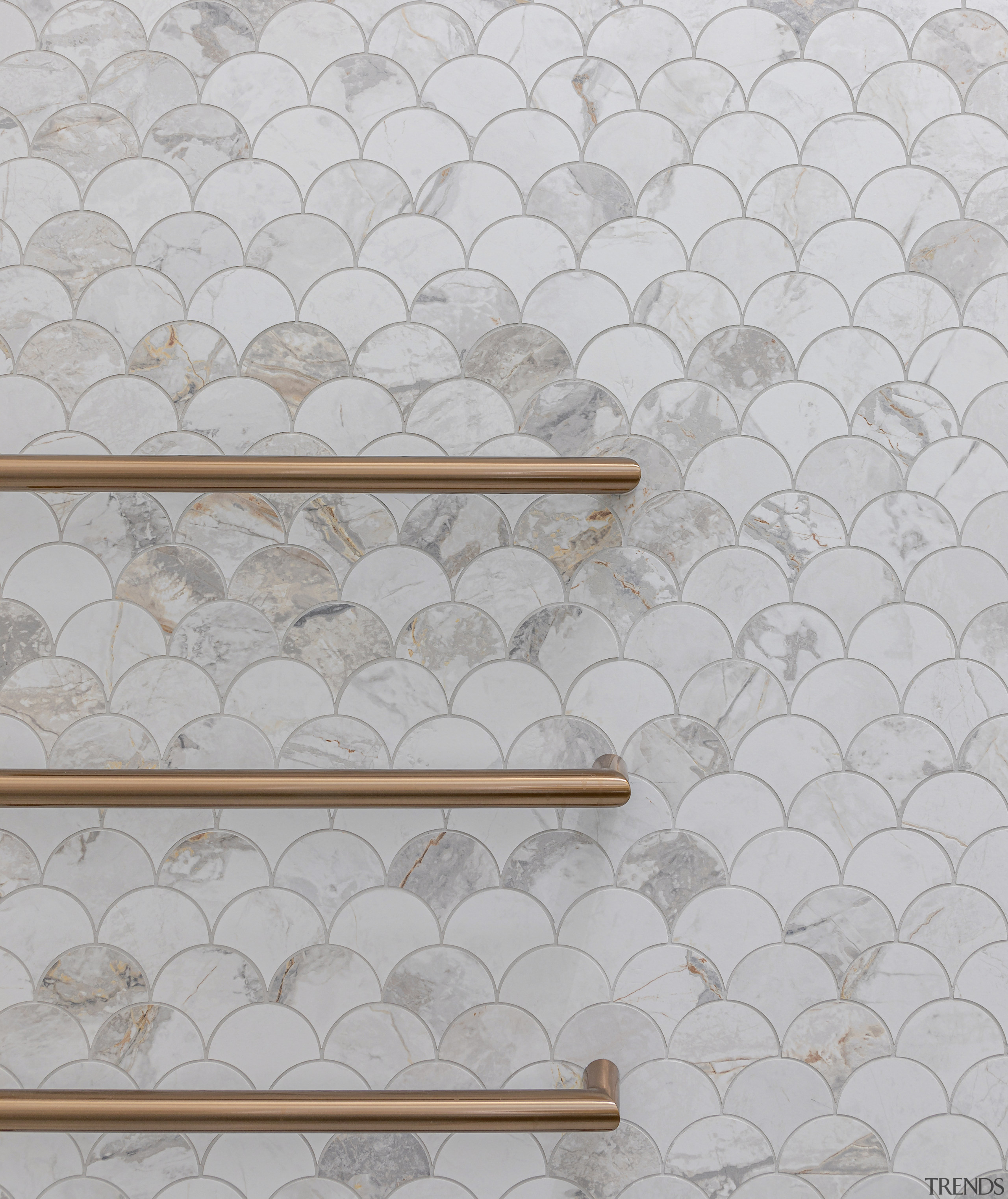 Bronze towel rails stand out against the shell 