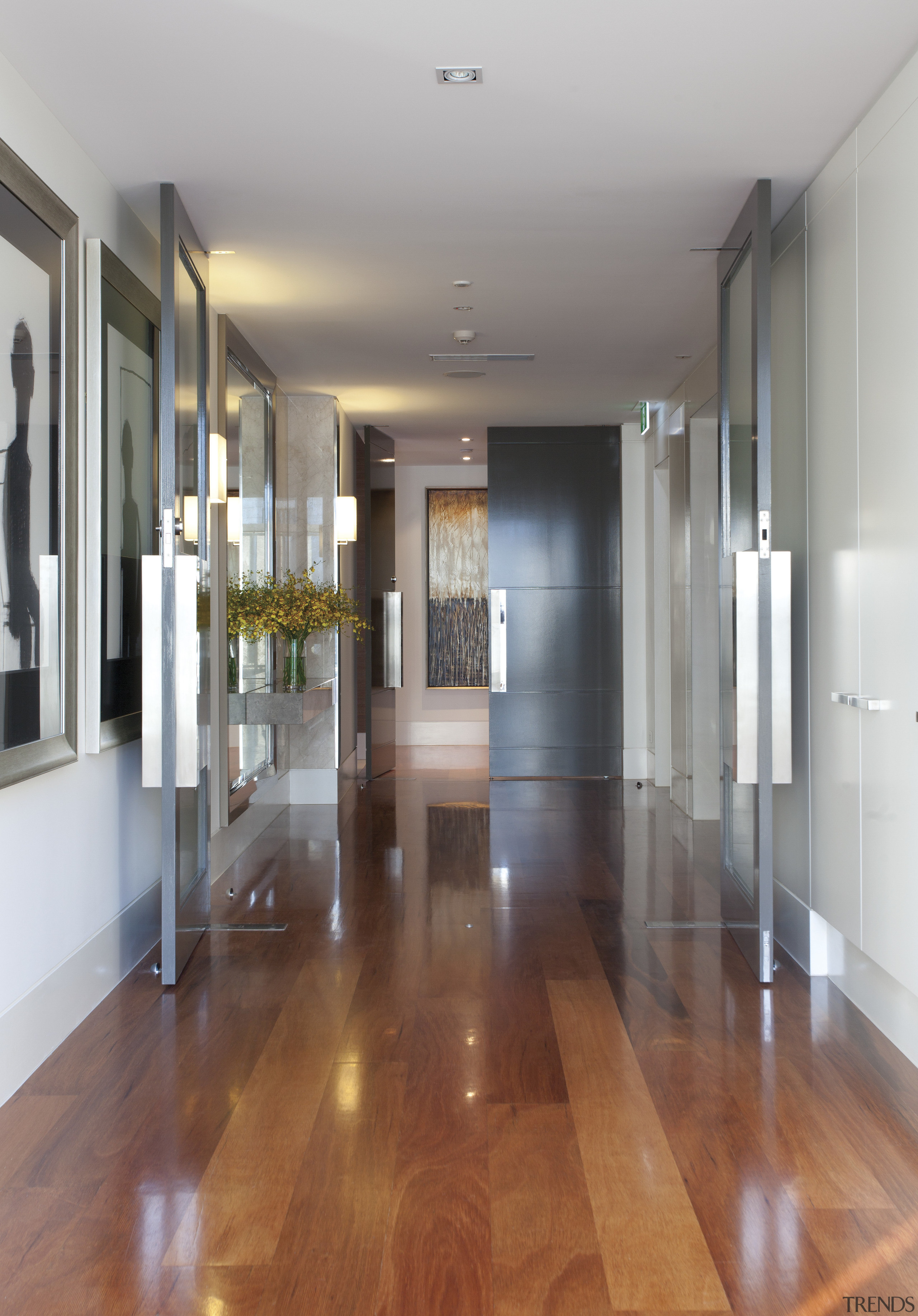 View of hallway with wooden flooring. - View apartment, ceiling, floor, flooring, hardwood, interior design, laminate flooring, lobby, real estate, wood, wood flooring, gray