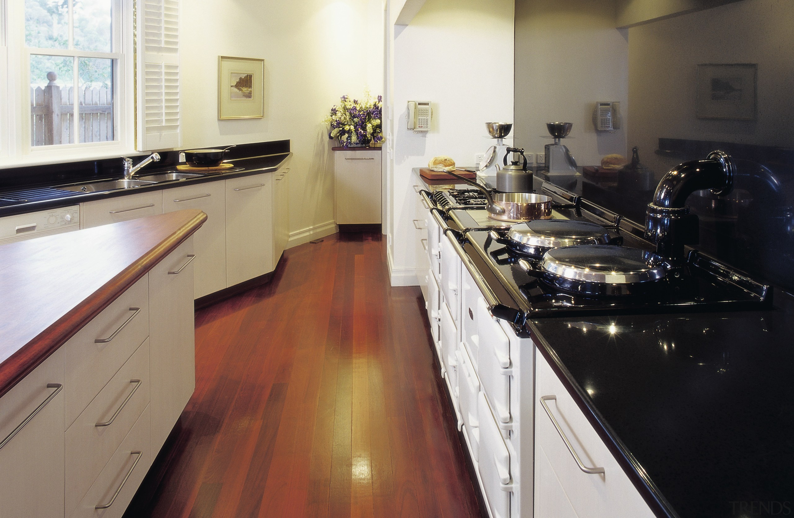 view of the hi-macs acrylic solid surface benchtop countertop, floor, flooring, hardwood, kitchen, room, white, black