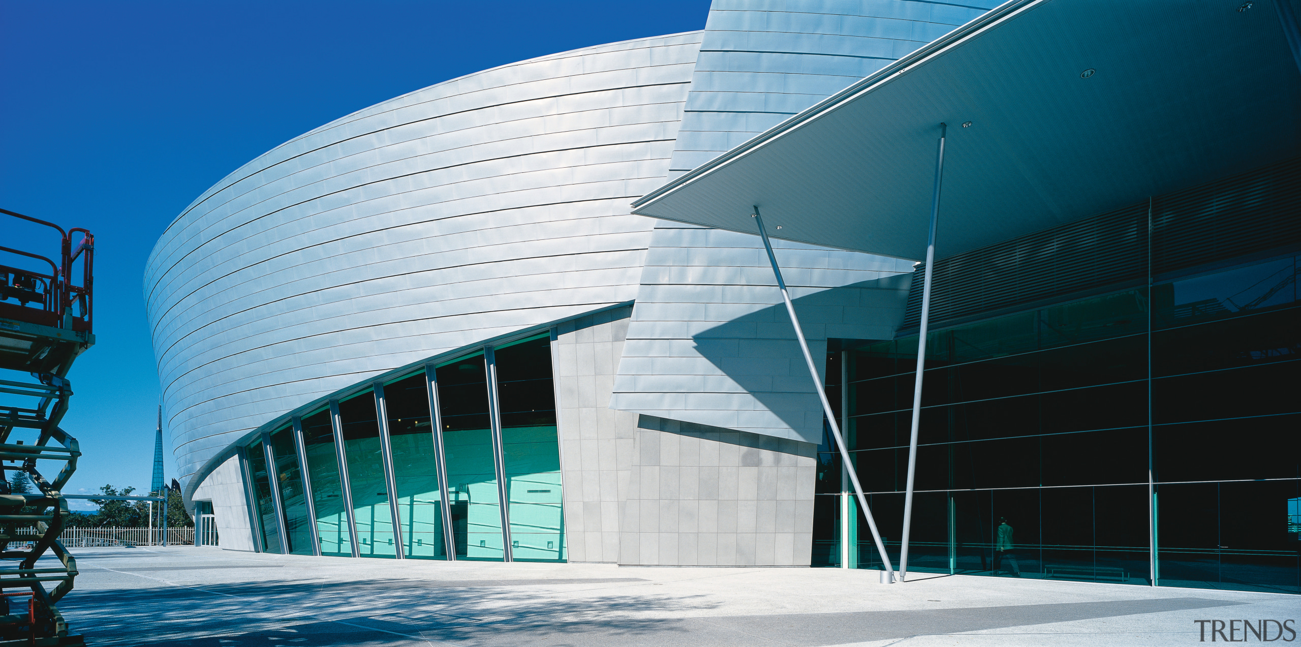 Exterior view of convention centre, showing zinc cladding architecture, building, commercial building, convention center, corporate headquarters, daylighting, daytime, facade, headquarters, landmark, line, reflection, sky, structure, tourist attraction, teal, white