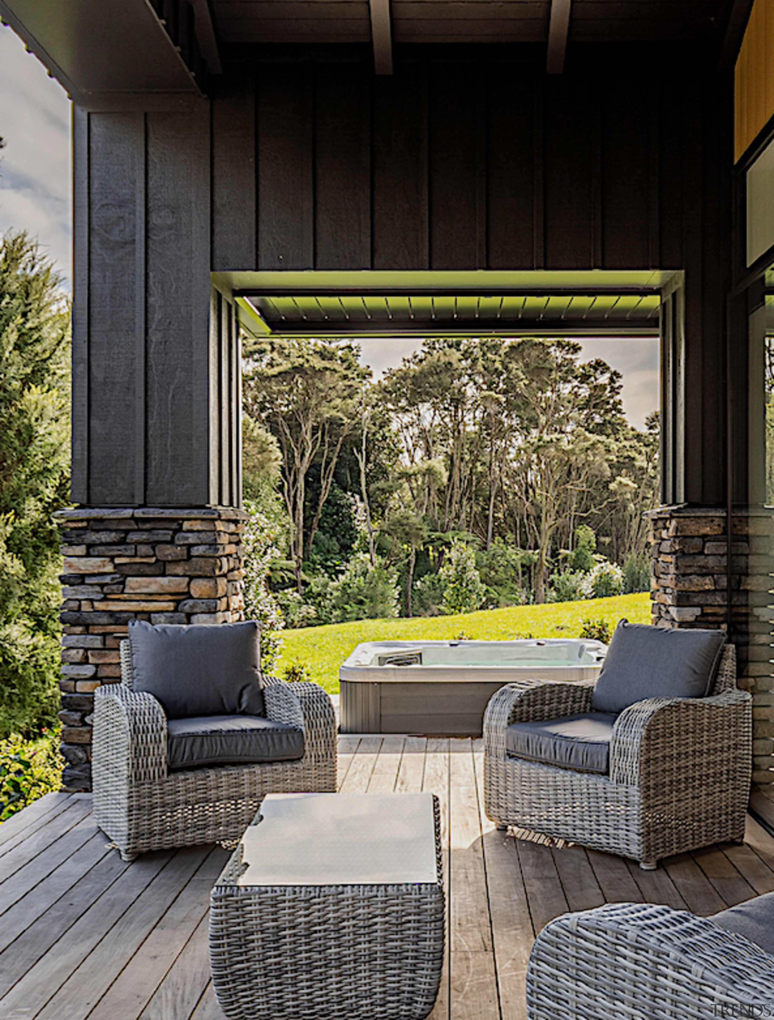 Looking from deck to spa pool and verdant 