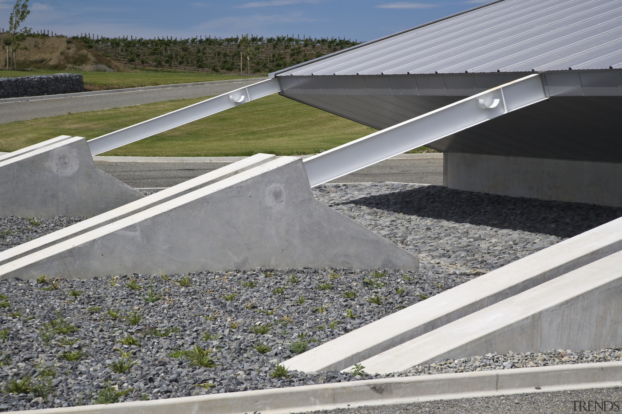 View of Buttresses coming off the side of asphalt, daylighting, infrastructure, road, roof, structure, gray
