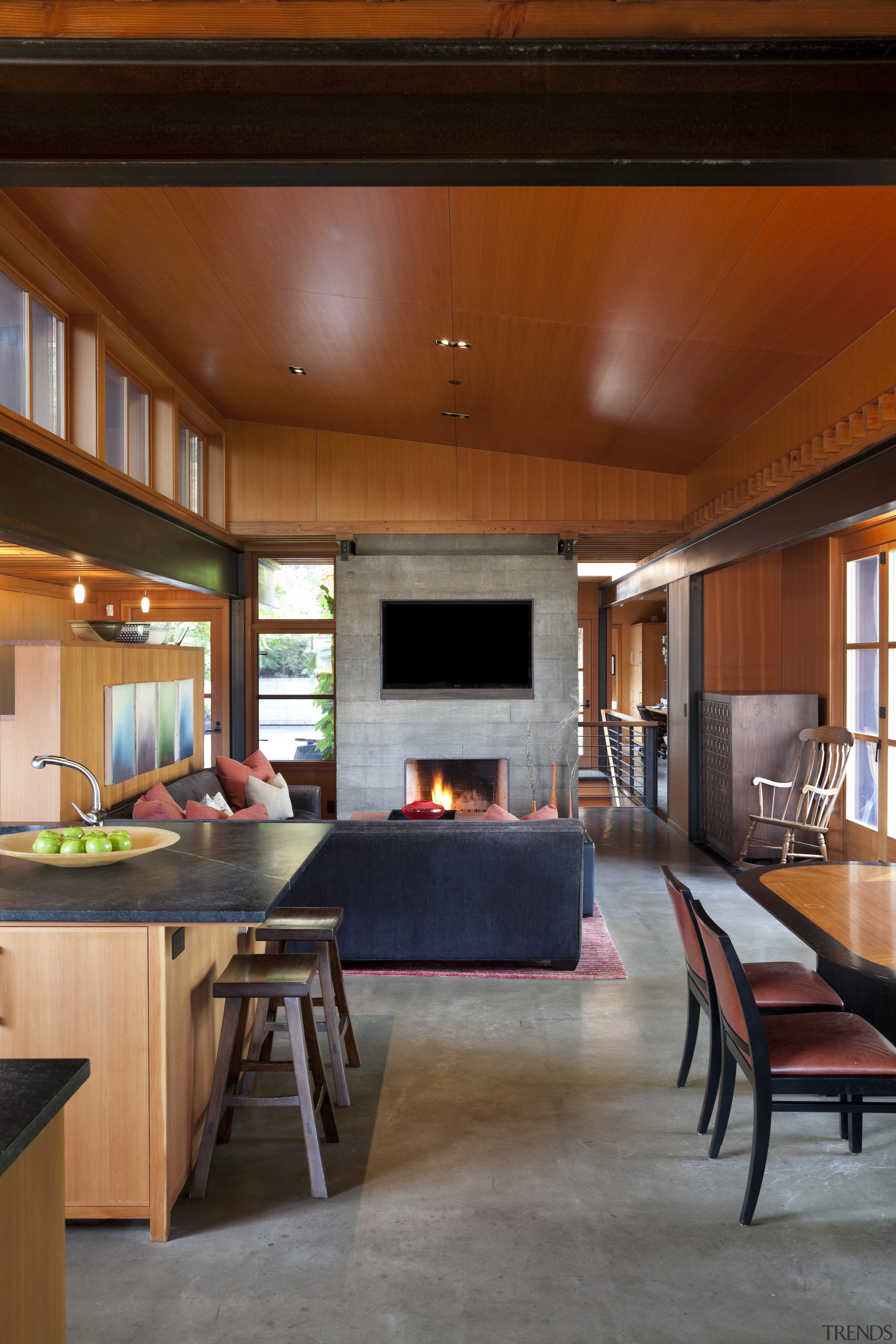 dining area, lounge and fireplace sit beyond kitchen ceiling, countertop, house, interior design, kitchen, living room, room, table, brown, gray