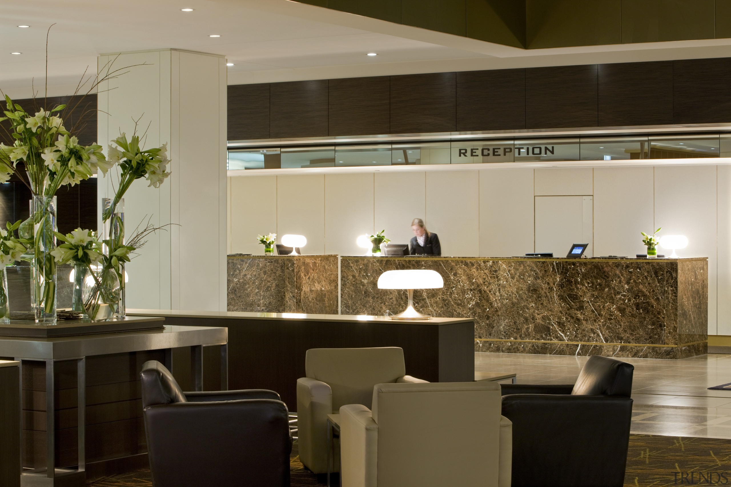 Interior view of the refurbished Sofitel Brisbane which countertop, interior design, kitchen, lobby, brown, orange