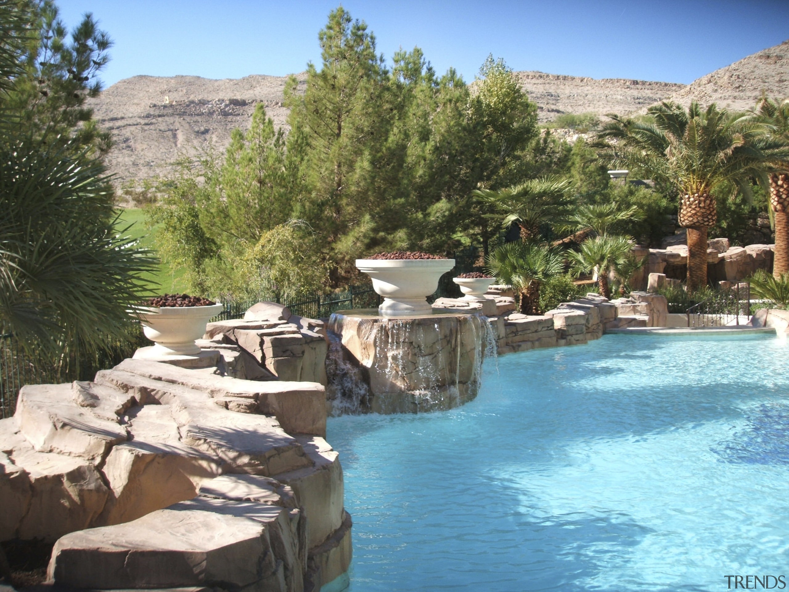 View of pool by ozzie Kraft Enterprises. - estate, leisure, resort, resort town, swimming pool, tourism, wadi, water, water feature, teal, brown