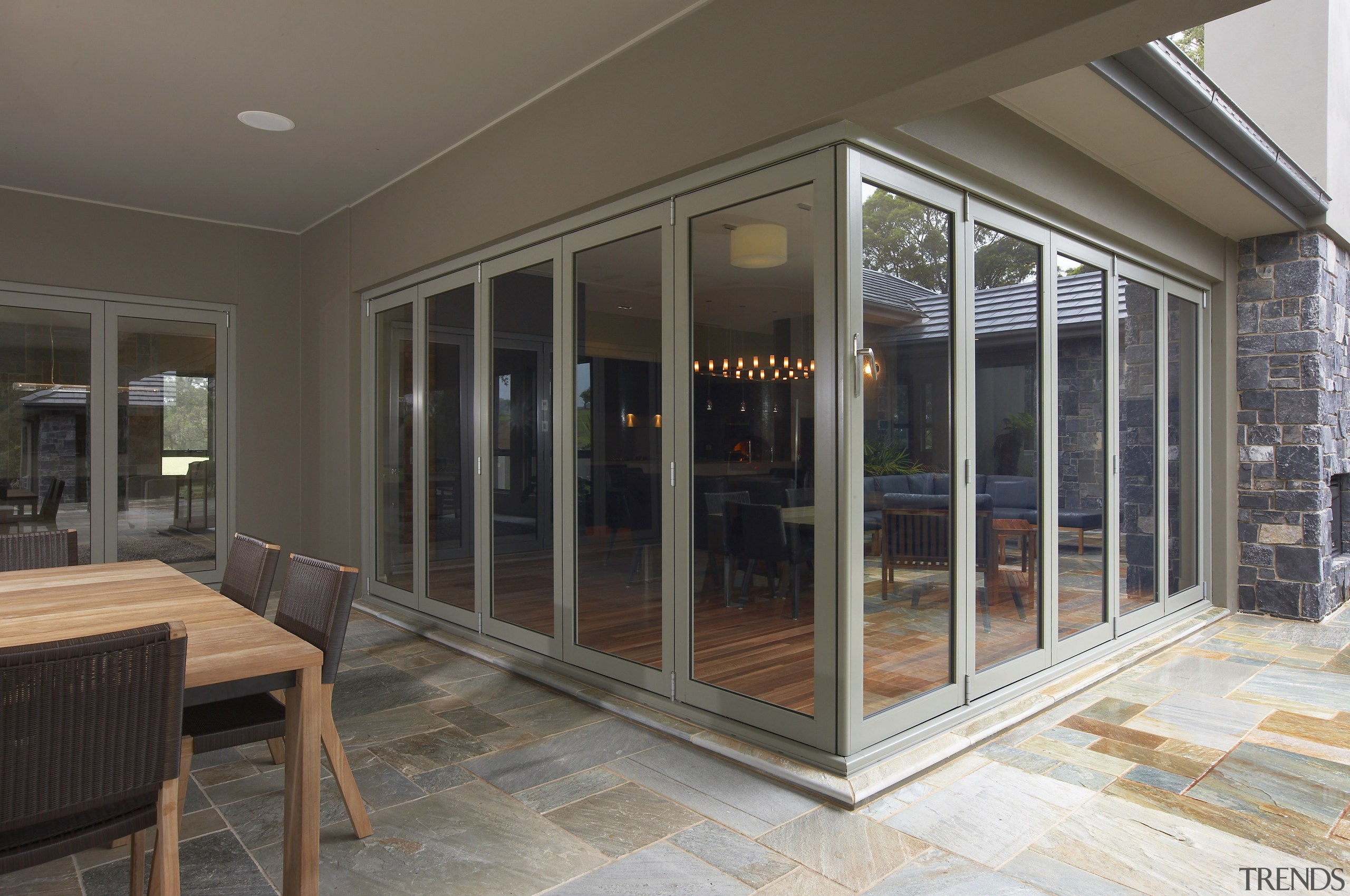Exterior view of the outdoor living area which door, porch, real estate, window, gray, black