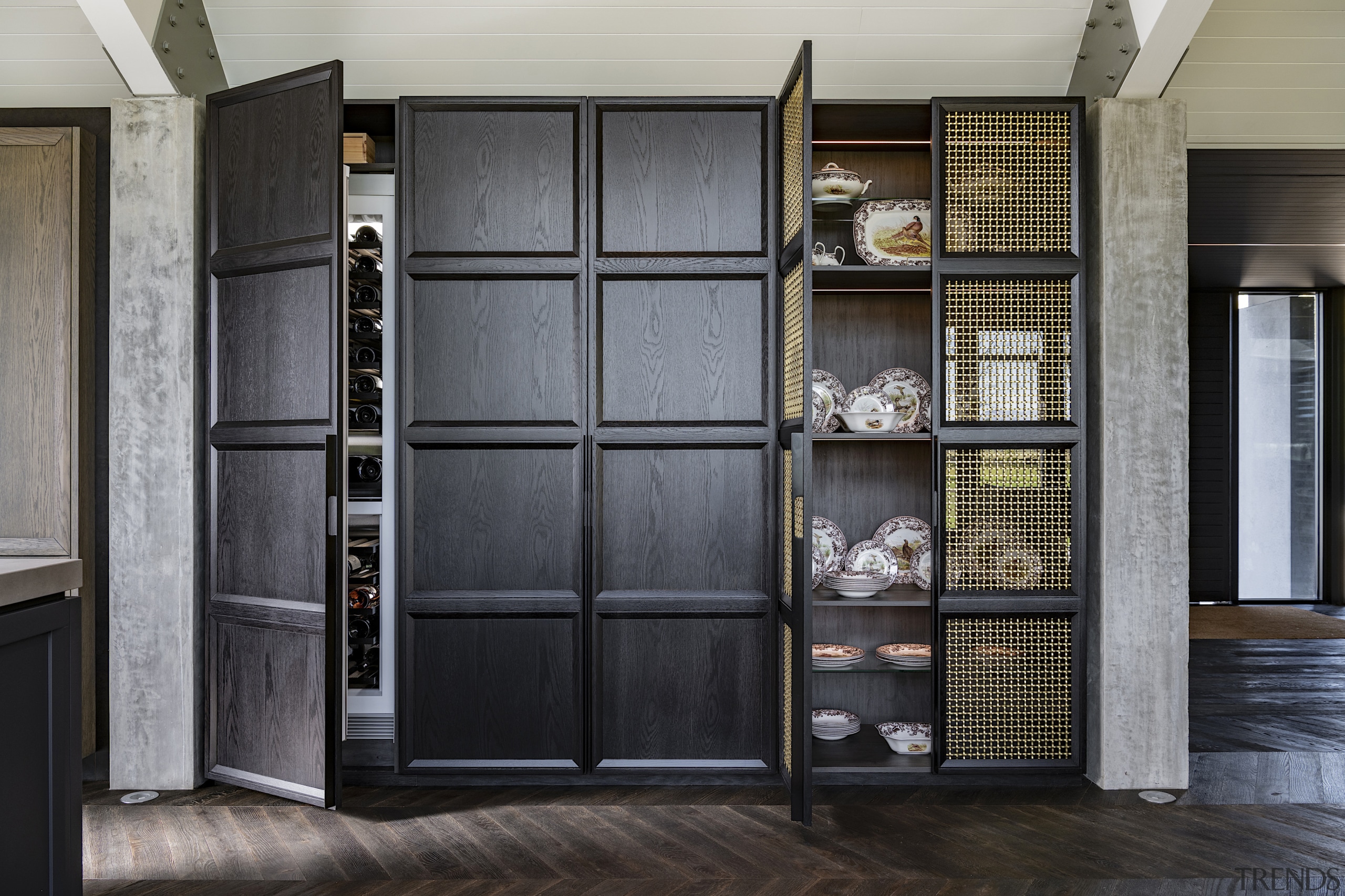 The working pantry zone houses hidden appliances including 