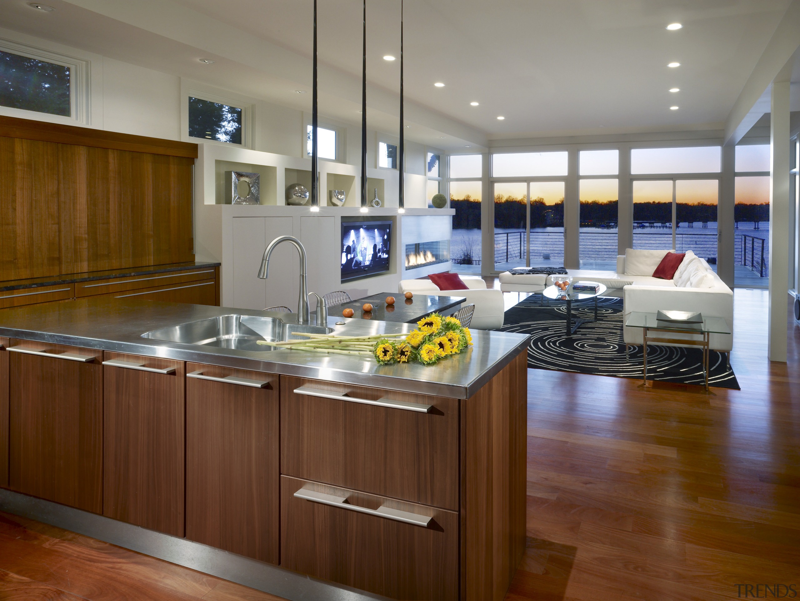 View of a kitchen which combines commerical touches cabinetry, countertop, floor, hardwood, interior design, kitchen, real estate, brown, gray