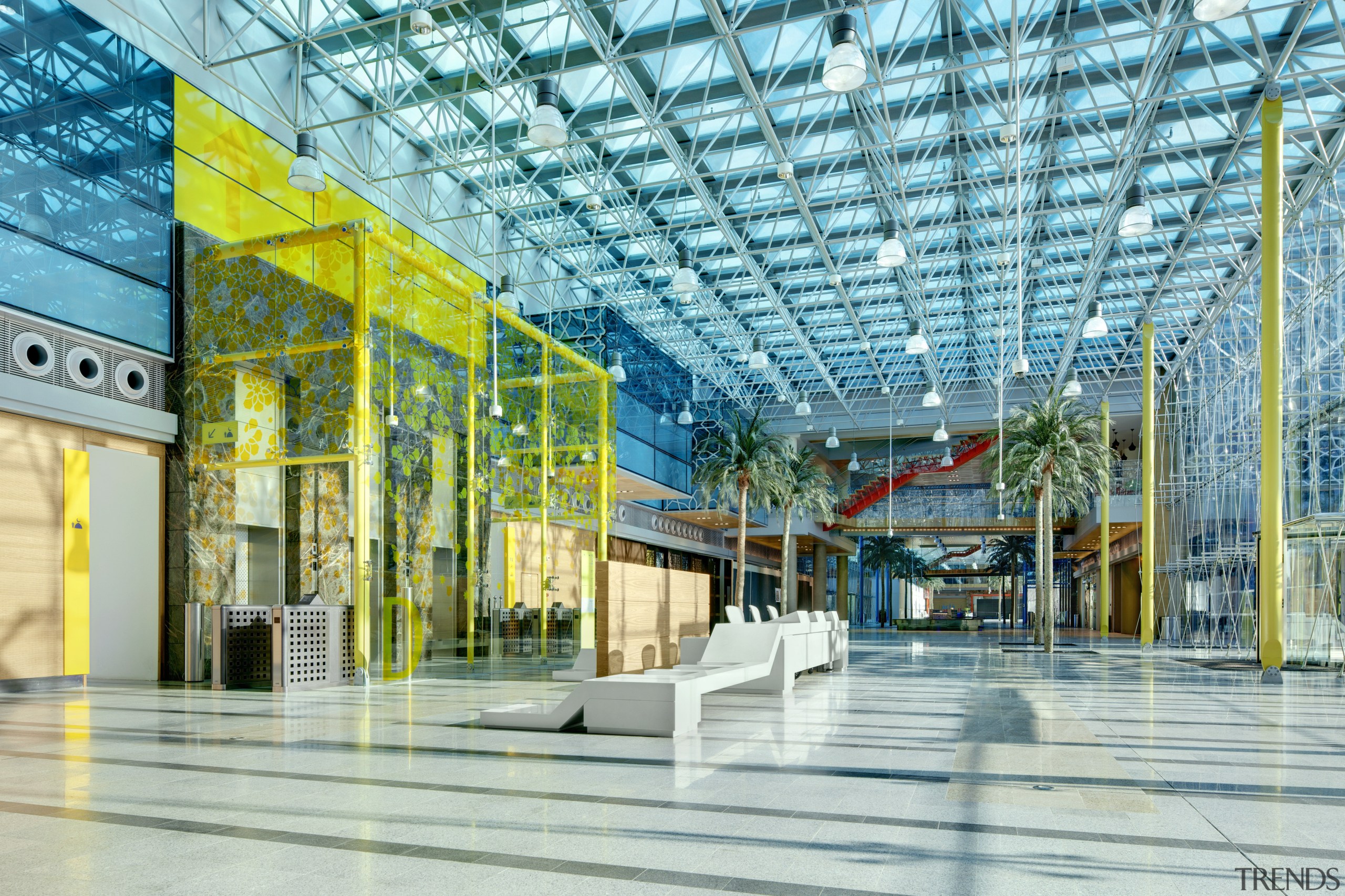 View of interior with turquoise and lime accents. architecture, building, commercial building, convention center, daylighting, leisure, leisure centre, lobby, metropolitan area, mixed use, shopping mall, structure, teal, gray