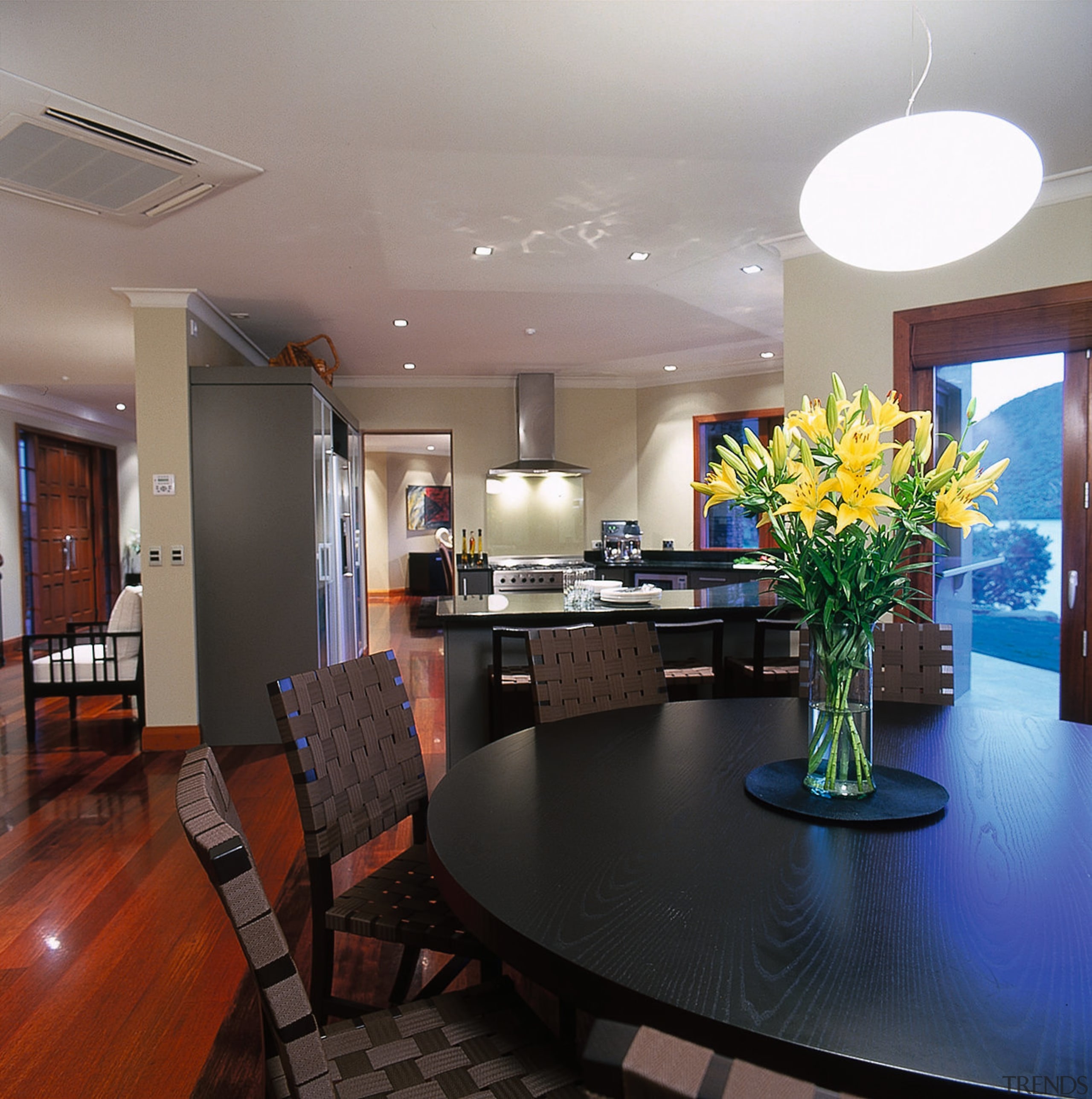 View of dining area. Features views of the apartment, ceiling, dining room, home, interior design, kitchen, living room, real estate, room, gray, black