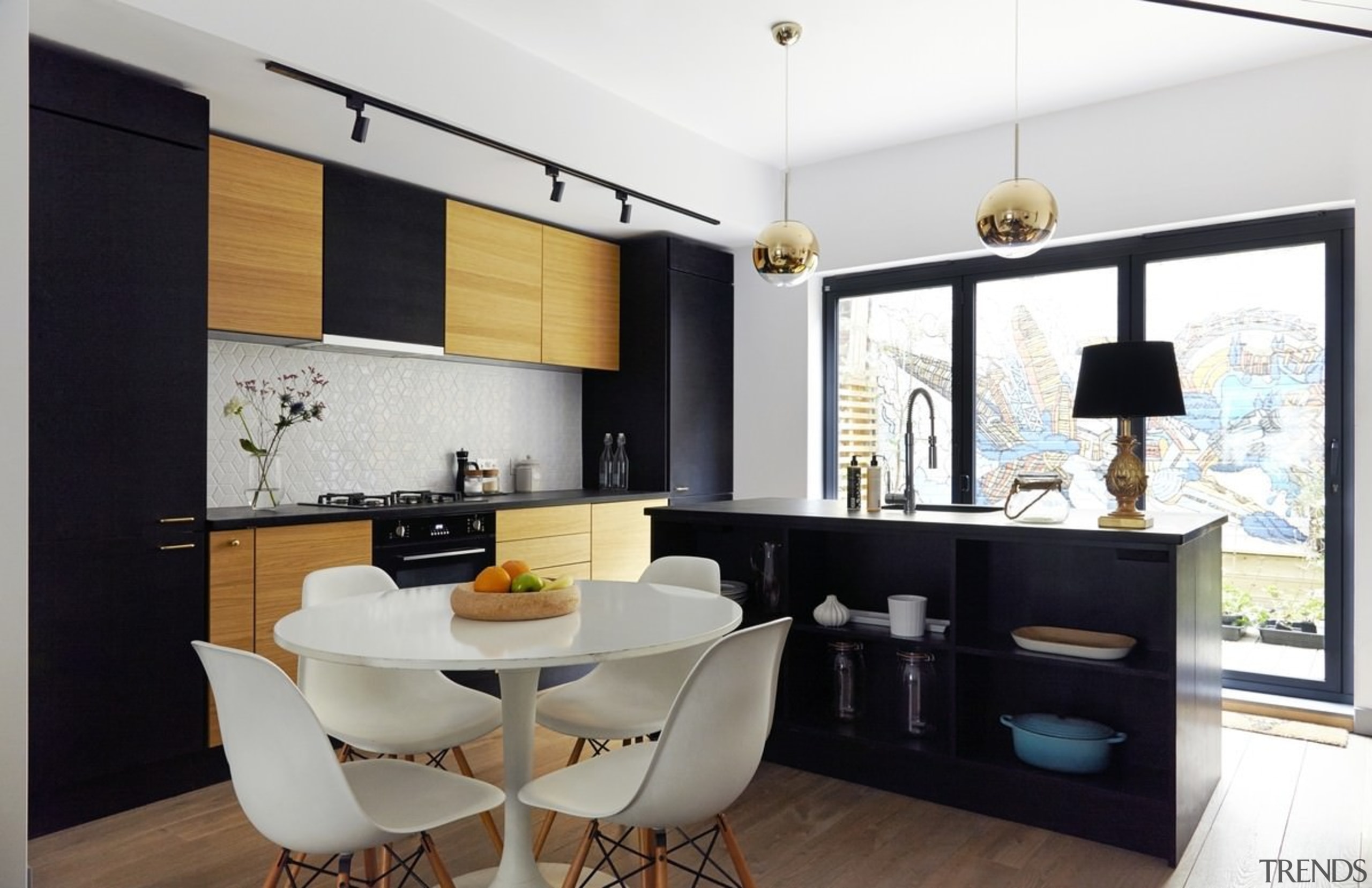 Arranging the island slightly differently means it's much ceiling, dining room, home, interior design, interior designer, living room, property, real estate, room, white, black