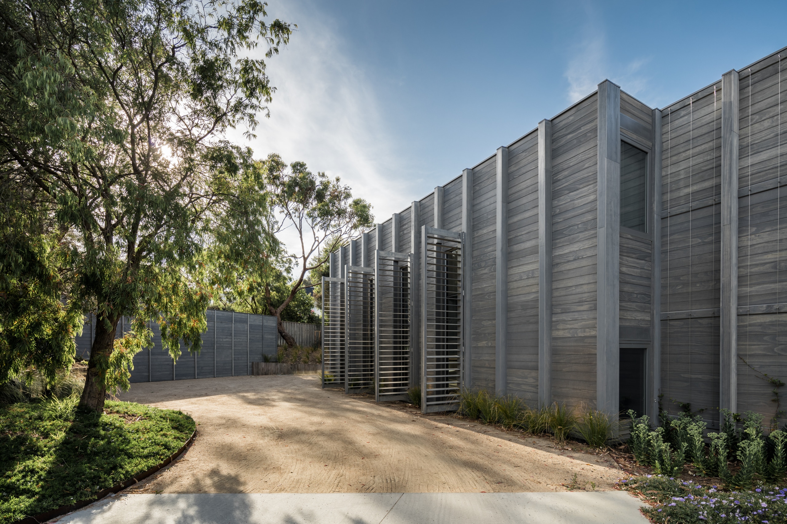 Operable shutters on this house facade  disguised architecture, building, condominium, corporate headquarters, estate, facade, headquarters, home, house, property, real estate, residential area, sky