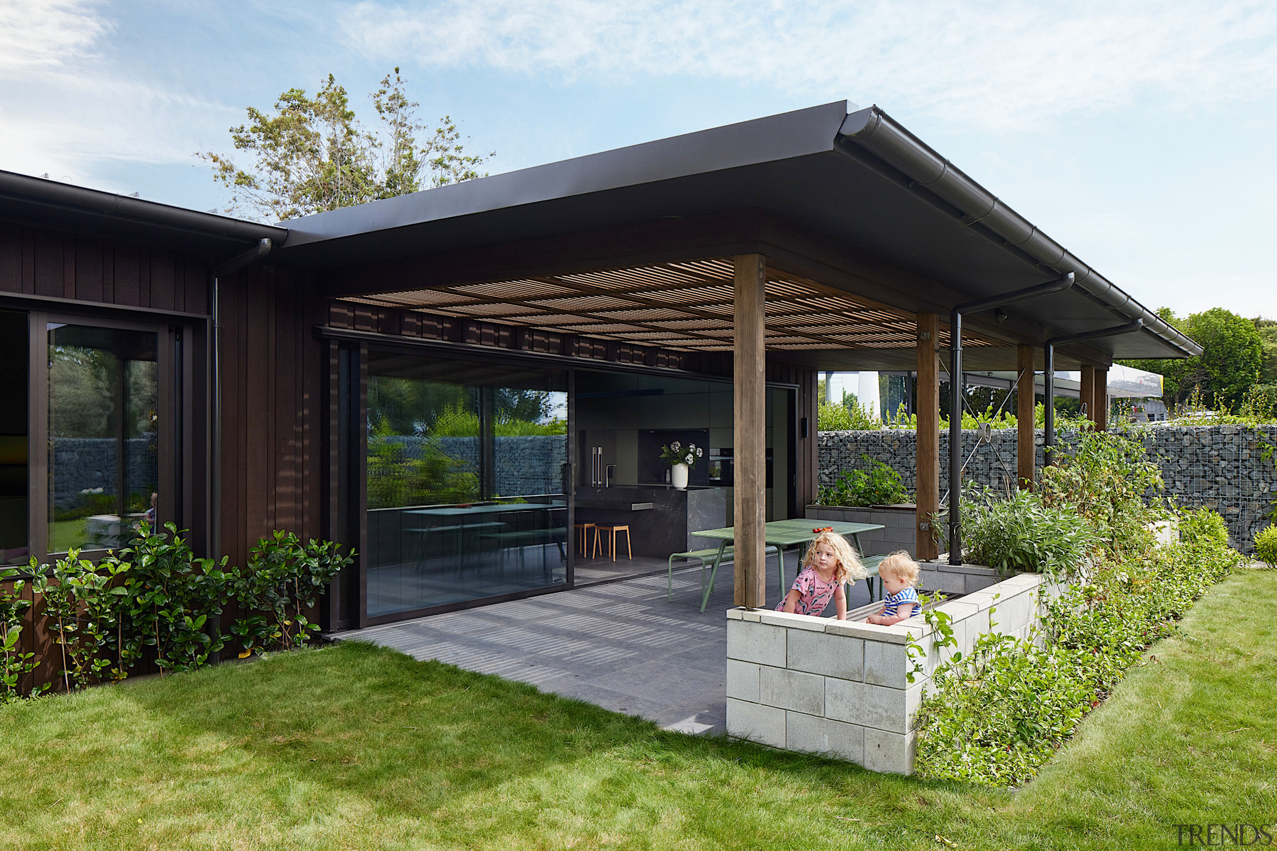 The outdoor room with kitchen beyond. - Cooking 