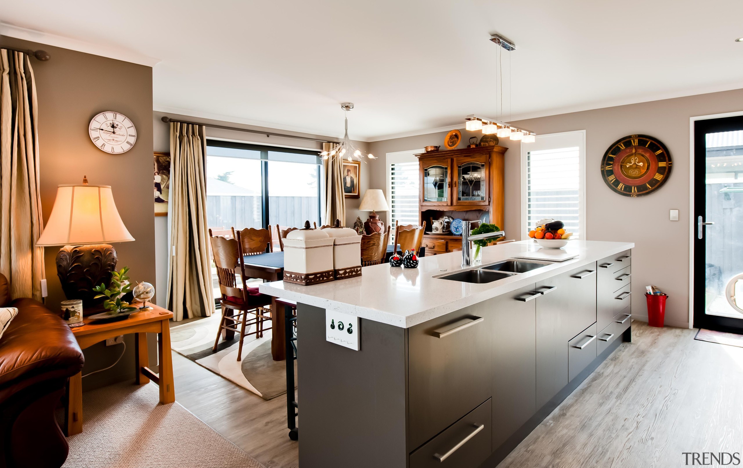 Open plan kitchen featured in a home built home, interior design, kitchen, living room, real estate, room, white