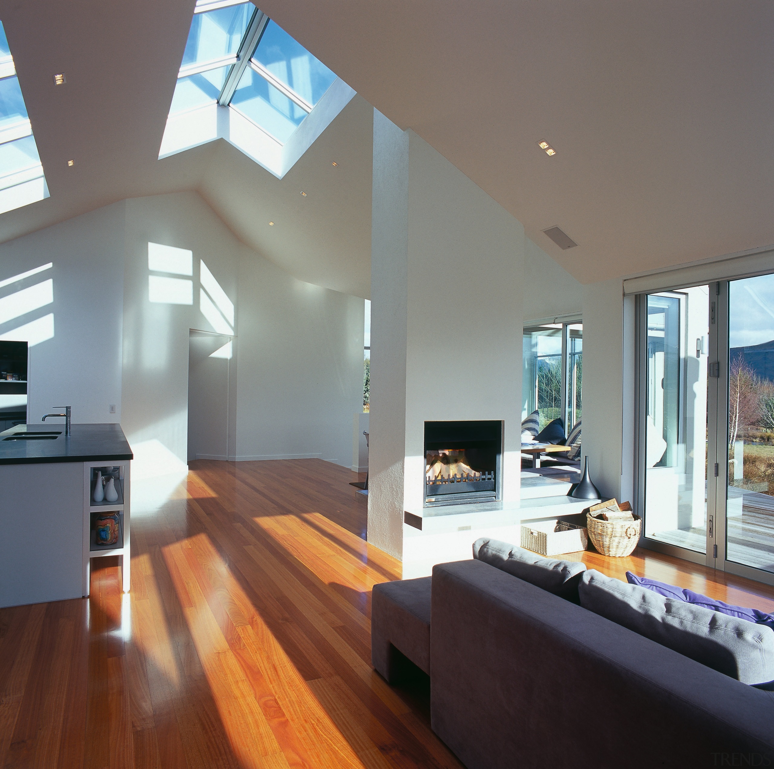 A view of the livinf area, wooden flooring, architecture, ceiling, daylighting, floor, flooring, hardwood, house, interior design, laminate flooring, living room, real estate, stairs, window, wood, wood flooring, gray