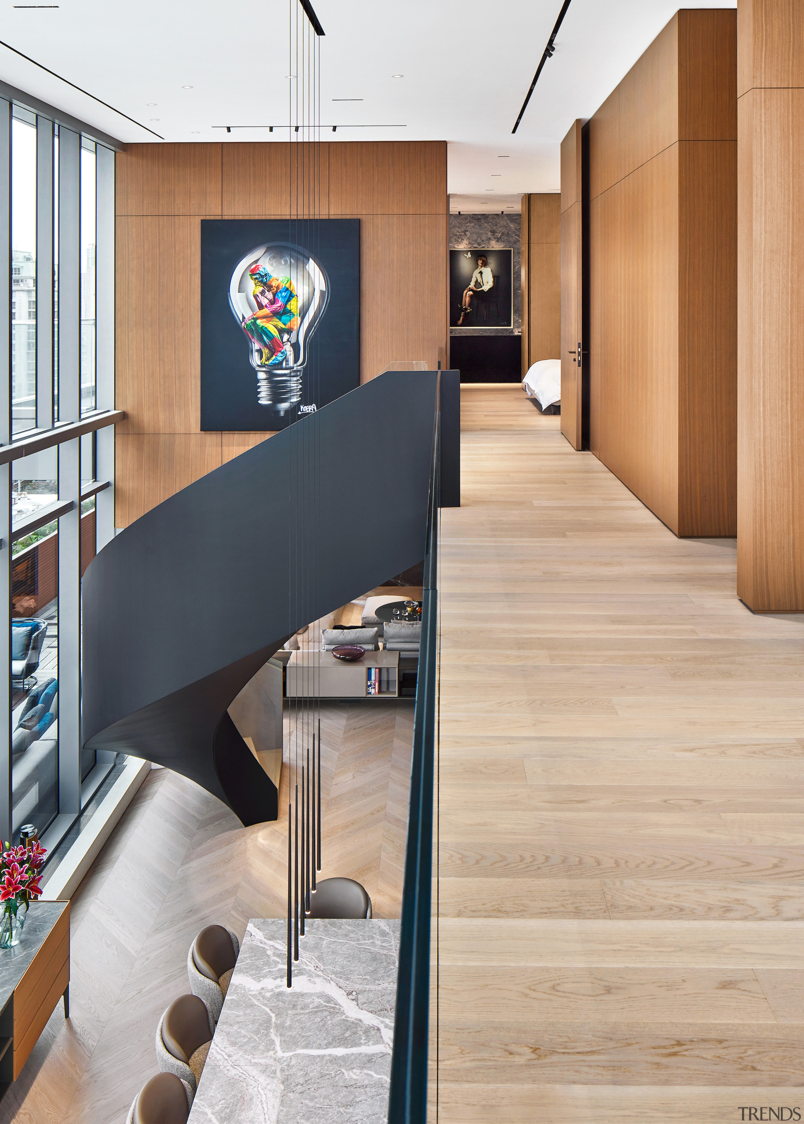 Looking down on the main floor living spaces.Photography 