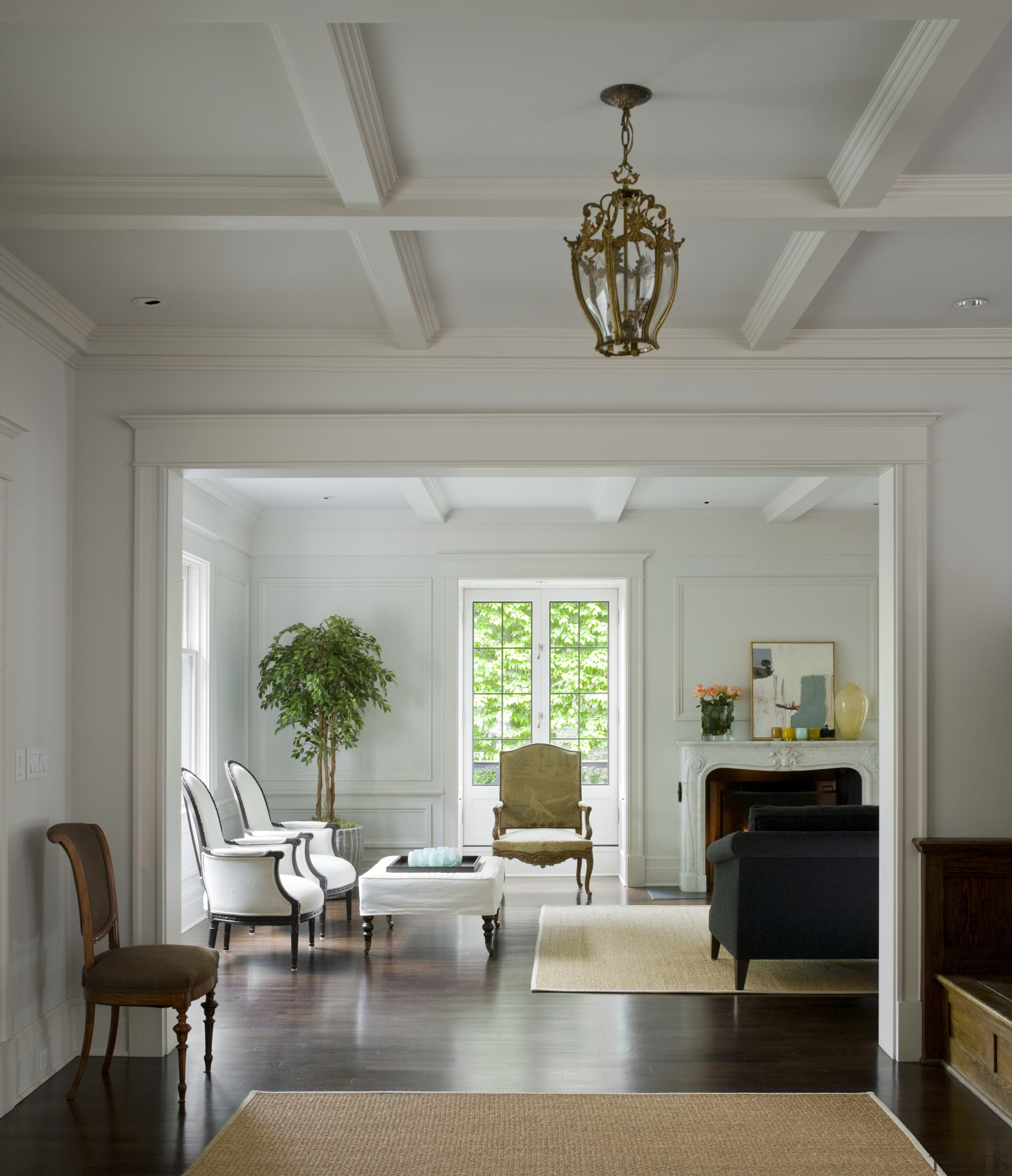 View of a living area inside this traditional ceiling, daylighting, floor, home, house, interior design, living room, room, wall, window, gray