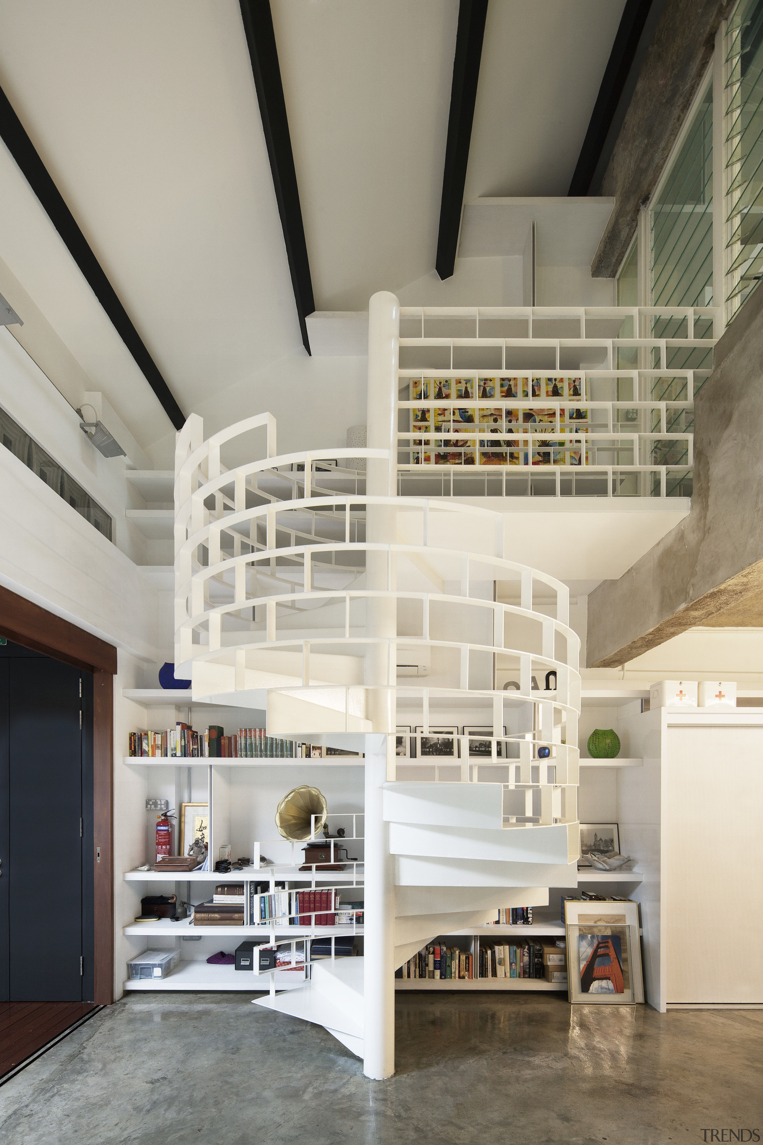 Although most of the interior of this office-apartment architecture, ceiling, daylighting, interior design, loft, shelf, shelving, stairs, gray