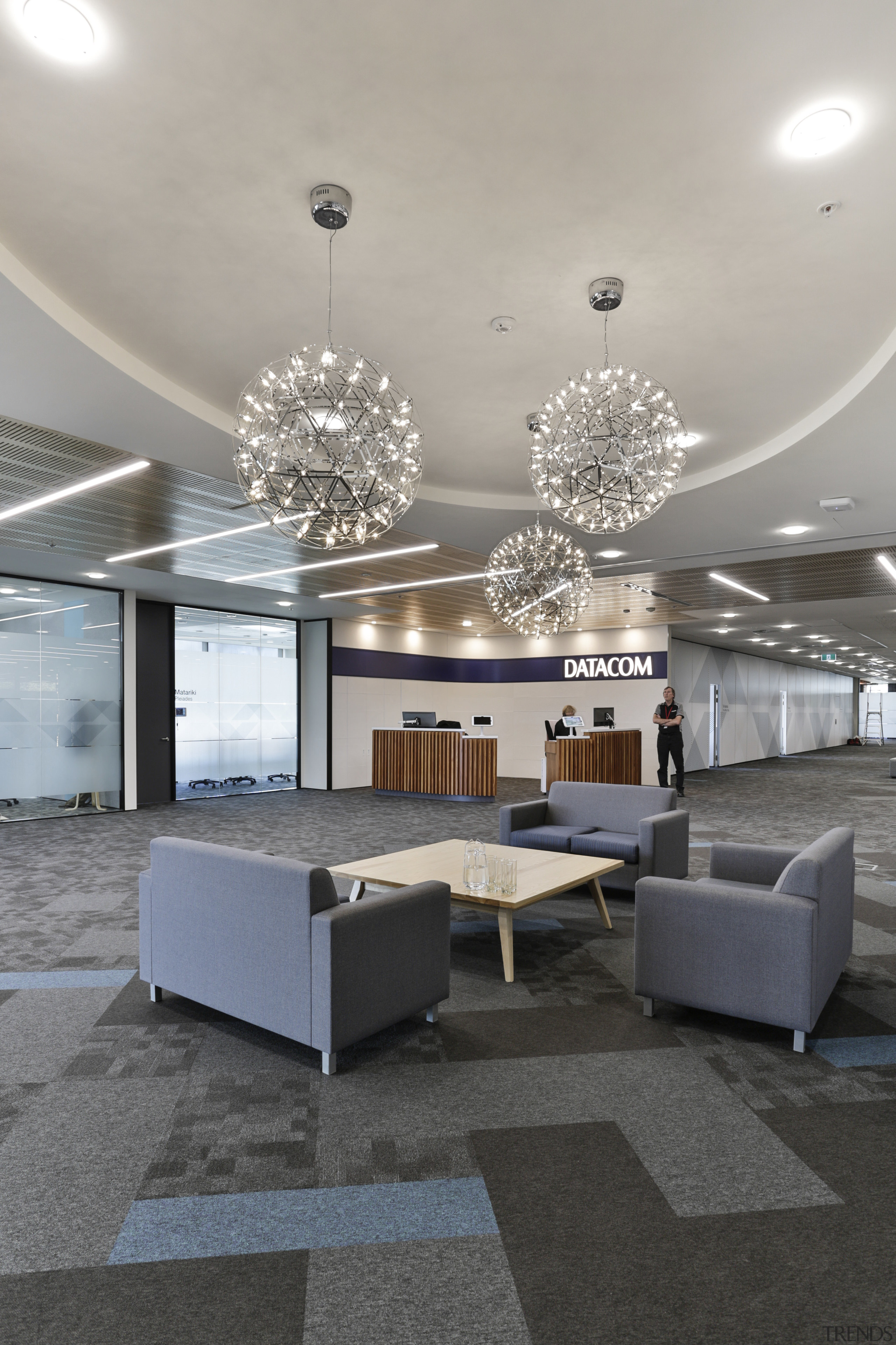 The reception desk in the Auckland Datacom fit-out architecture, ceiling, coffee table, daylighting, floor, flooring, furniture, interior design, lobby, product design, table, gray