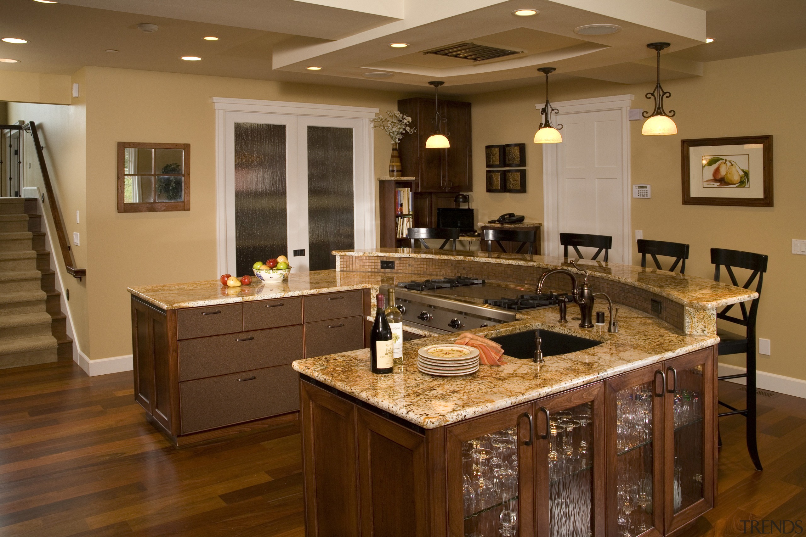 Hardwearing surfaces were on the clients list of cabinetry, countertop, cuisine classique, floor, flooring, hardwood, interior design, kitchen, living room, room, wood flooring, brown