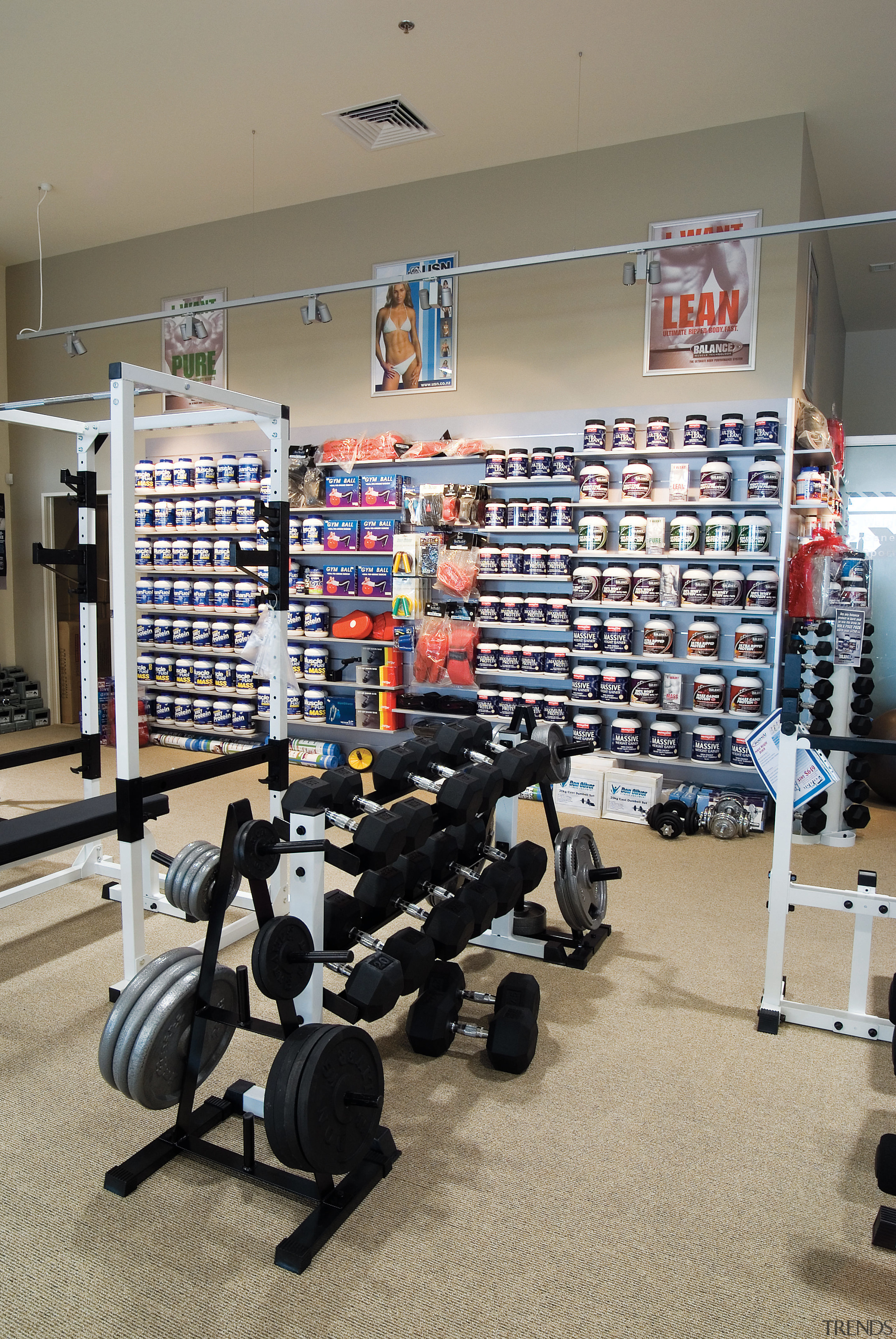 A view of a fitness store in Sylvia gym, physical fitness, retail, room, sport venue, structure, weight training, gray