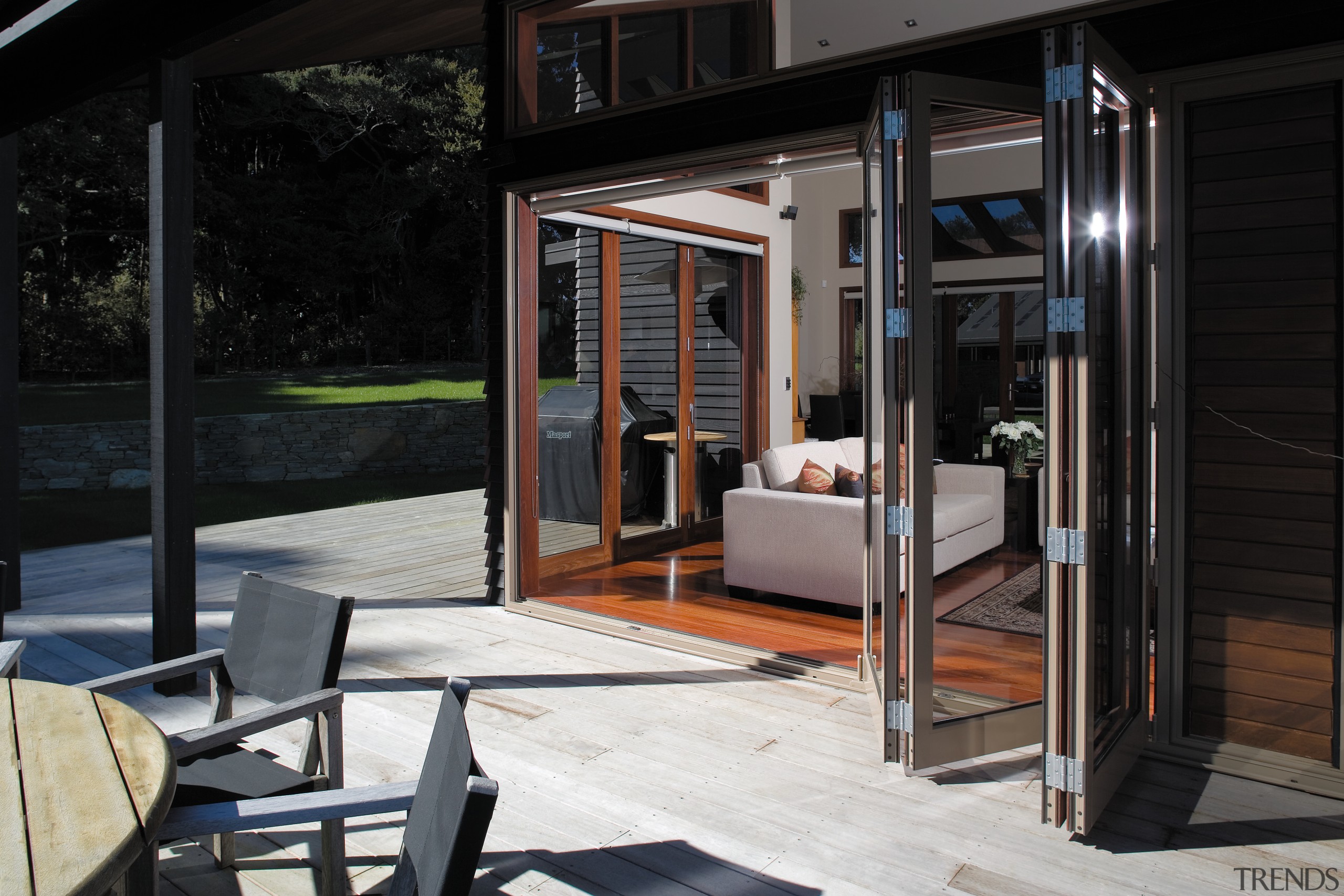 View of decking with bifold aluminium doors leading door, house, window, black