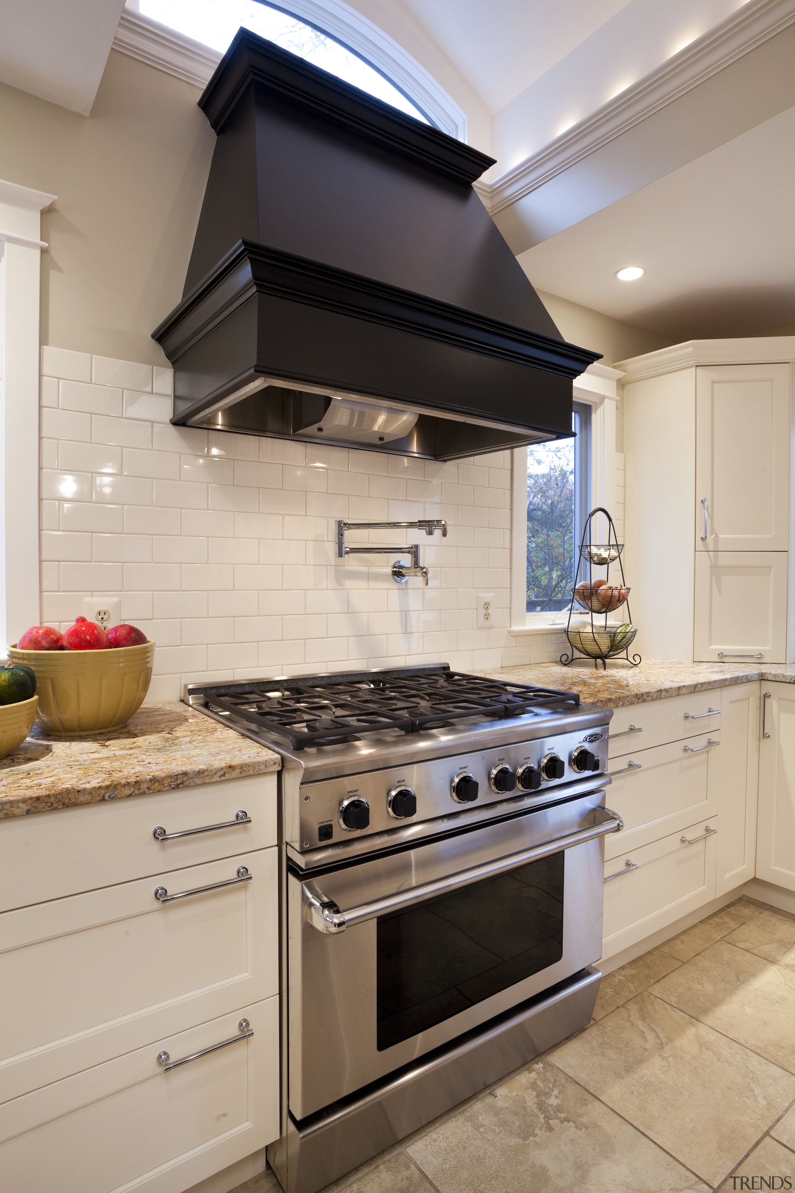 This kitchen was designed by Nadia Subaran of cabinetry, countertop, cuisine classique, gas stove, home appliance, interior design, kitchen, kitchen appliance, kitchen stove, major appliance, oven, room, gray