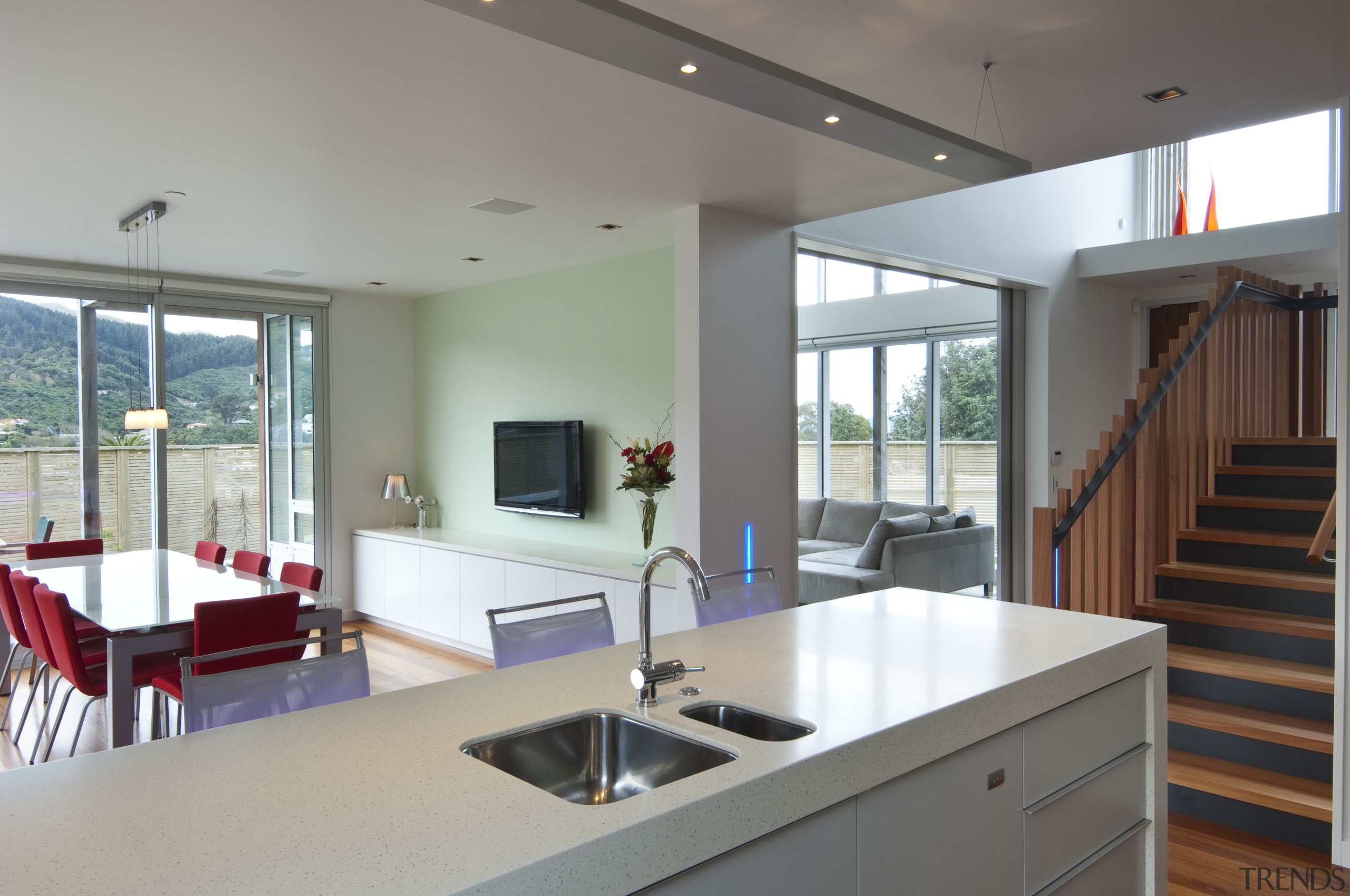 VIew white kitchen in contemporary home. - VIew architecture, countertop, daylighting, house, interior design, kitchen, living room, real estate, window, gray