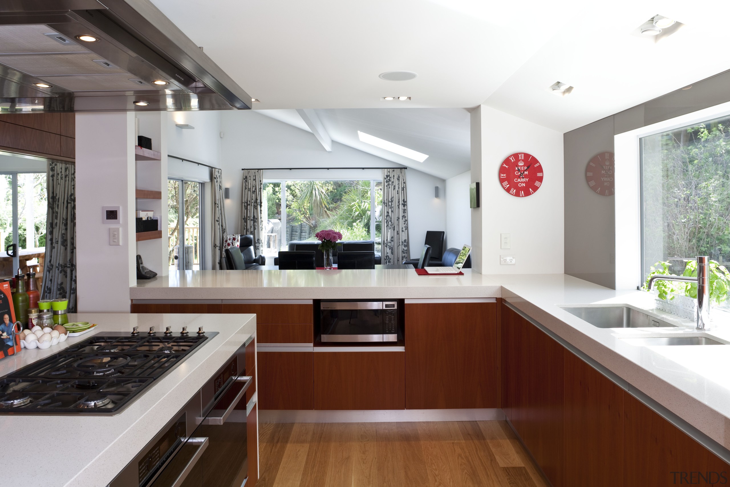 View of kitchen which features oak floors, kitchen countertop, interior design, kitchen, real estate, white