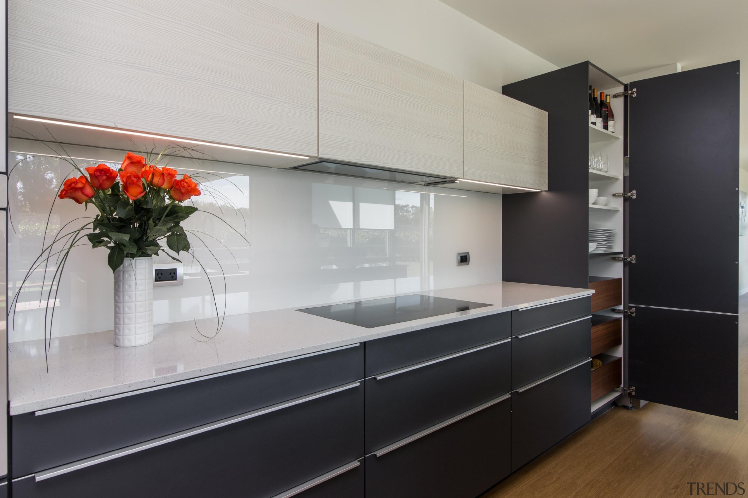 Great use of space for kitchen storageFor more cabinetry, countertop, interior design, kitchen, gray, black