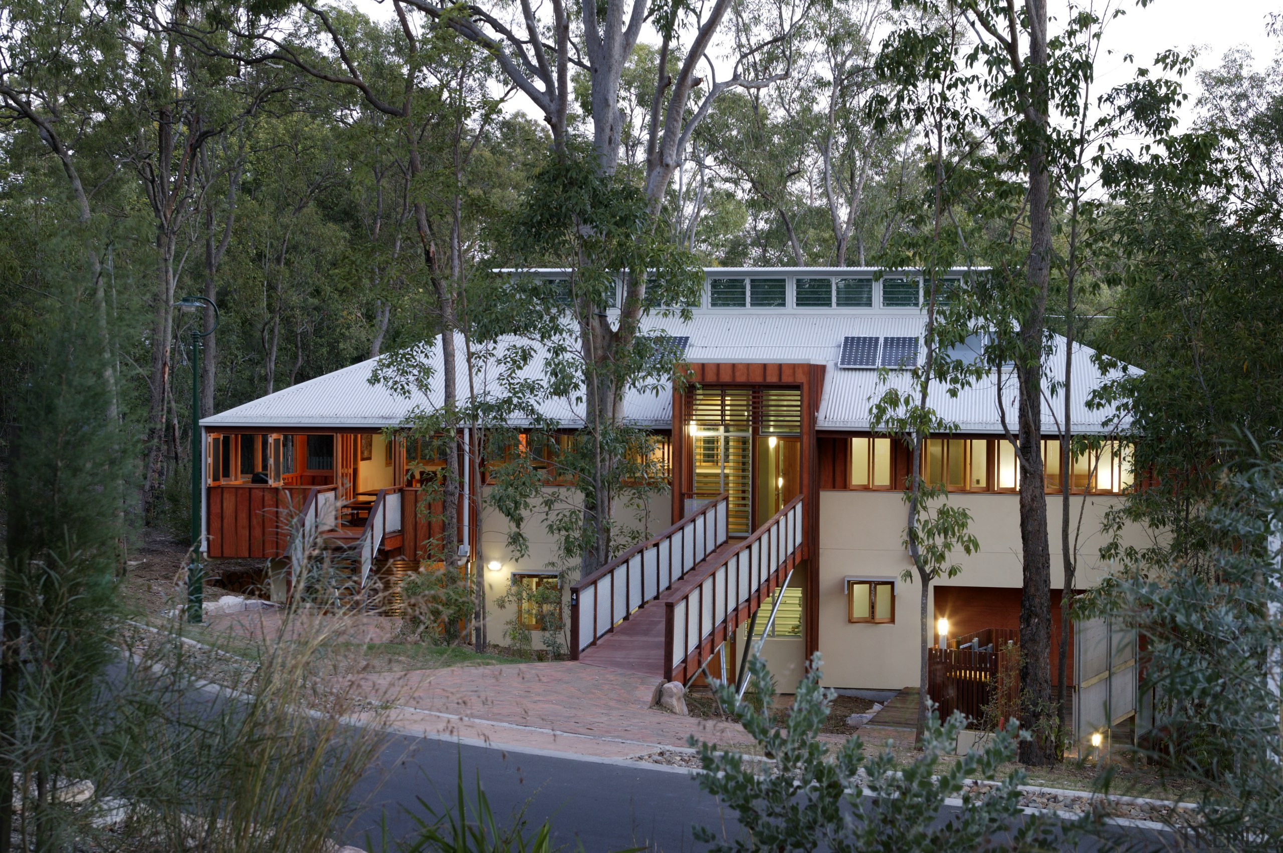 External view of sustainable house built by Natural architecture, cottage, home, house, property, real estate, tree, gray, black