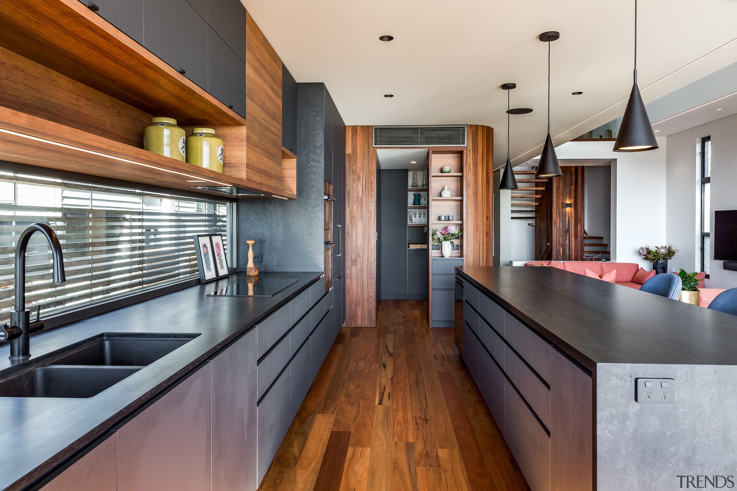 Rich timber-look surfaces work well with the black 