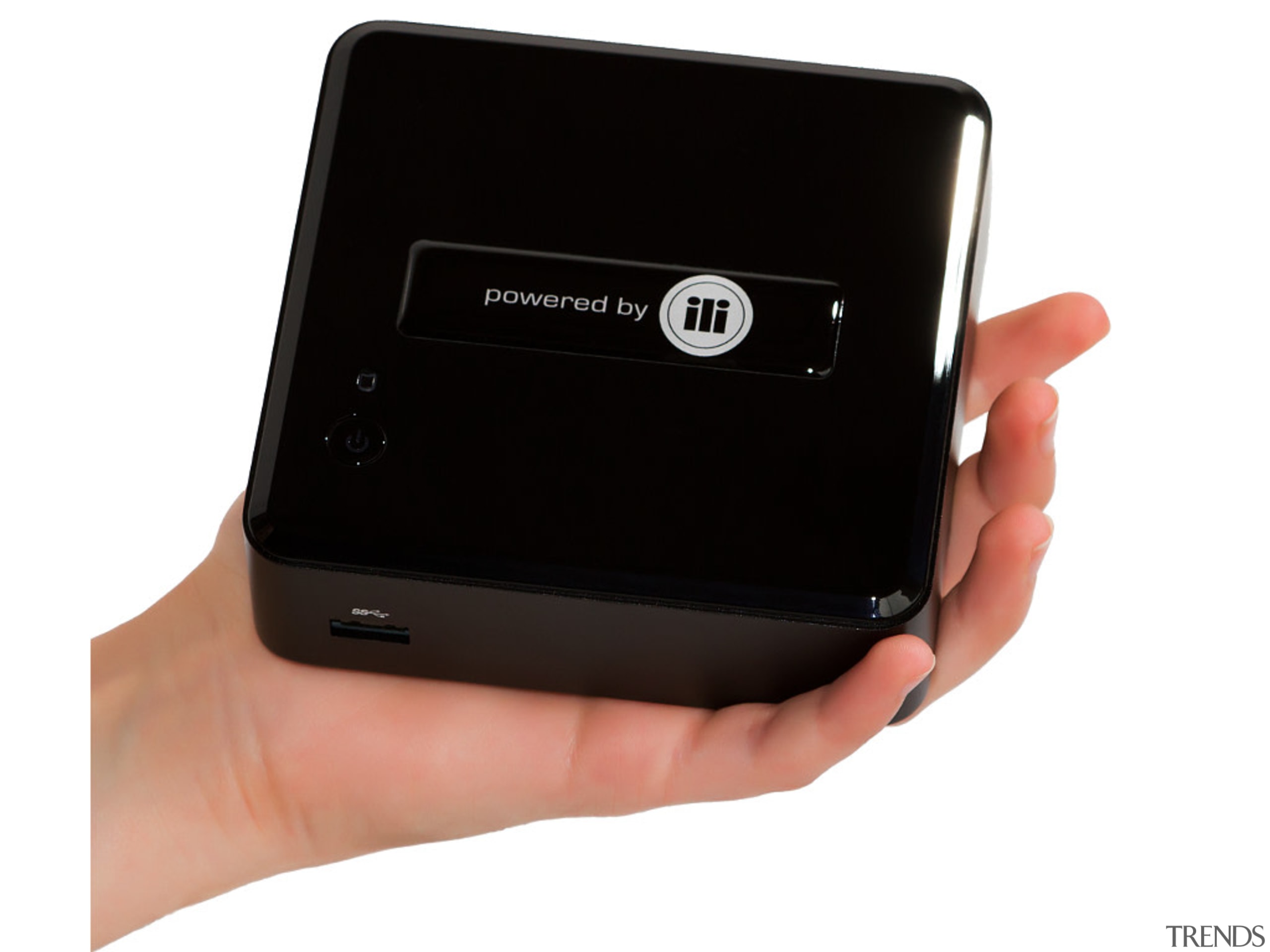 Small enough to easily go behind your TV communication device, electronic device, electronics, electronics accessory, gadget, mobile phone, multimedia, product, product design, technology, white, black