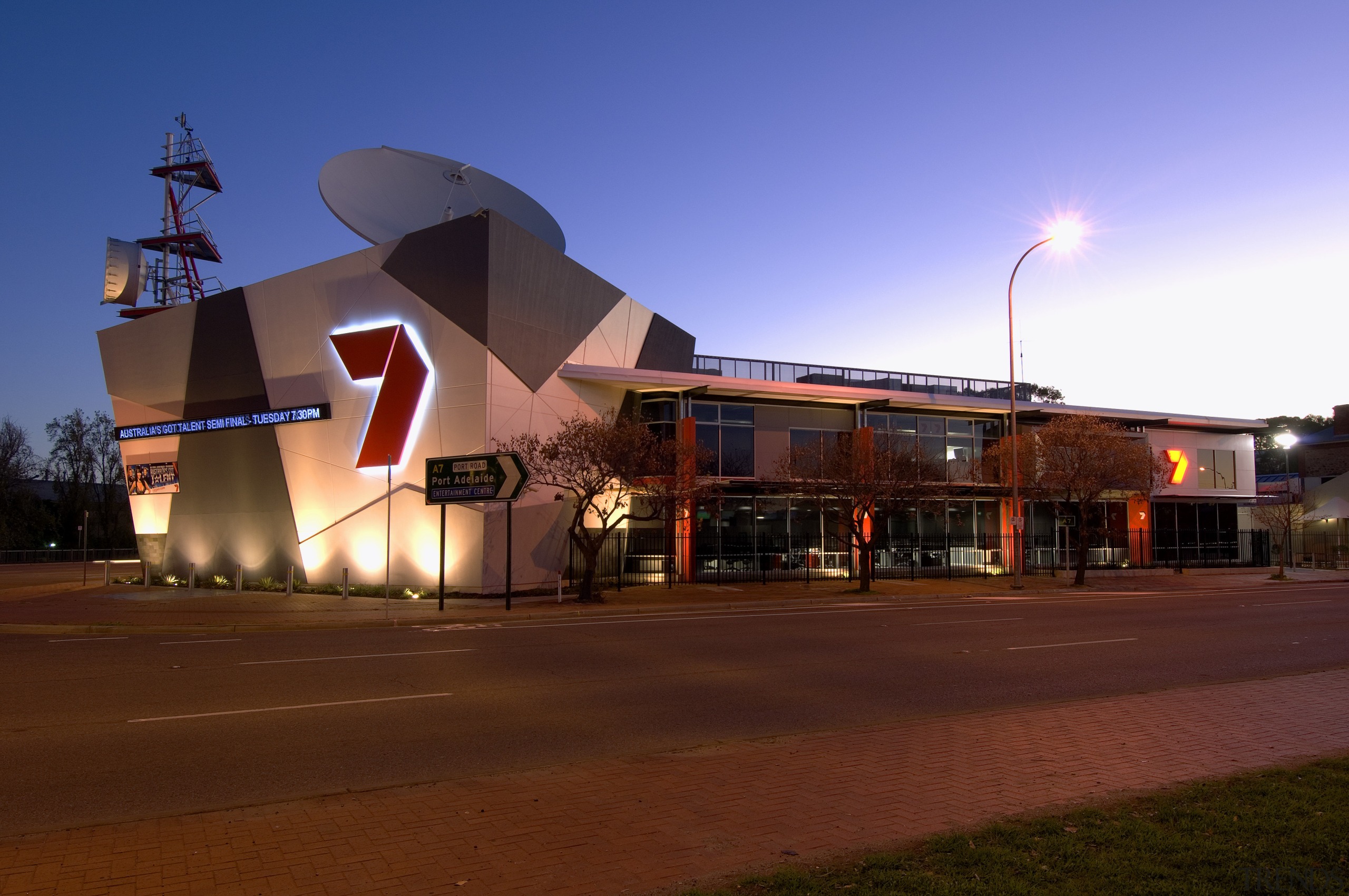 The Channel Seven studio and offices compenstae for architecture, building, city, downtown, dusk, evening, lighting, night, residential area, sky, structure, red, blue