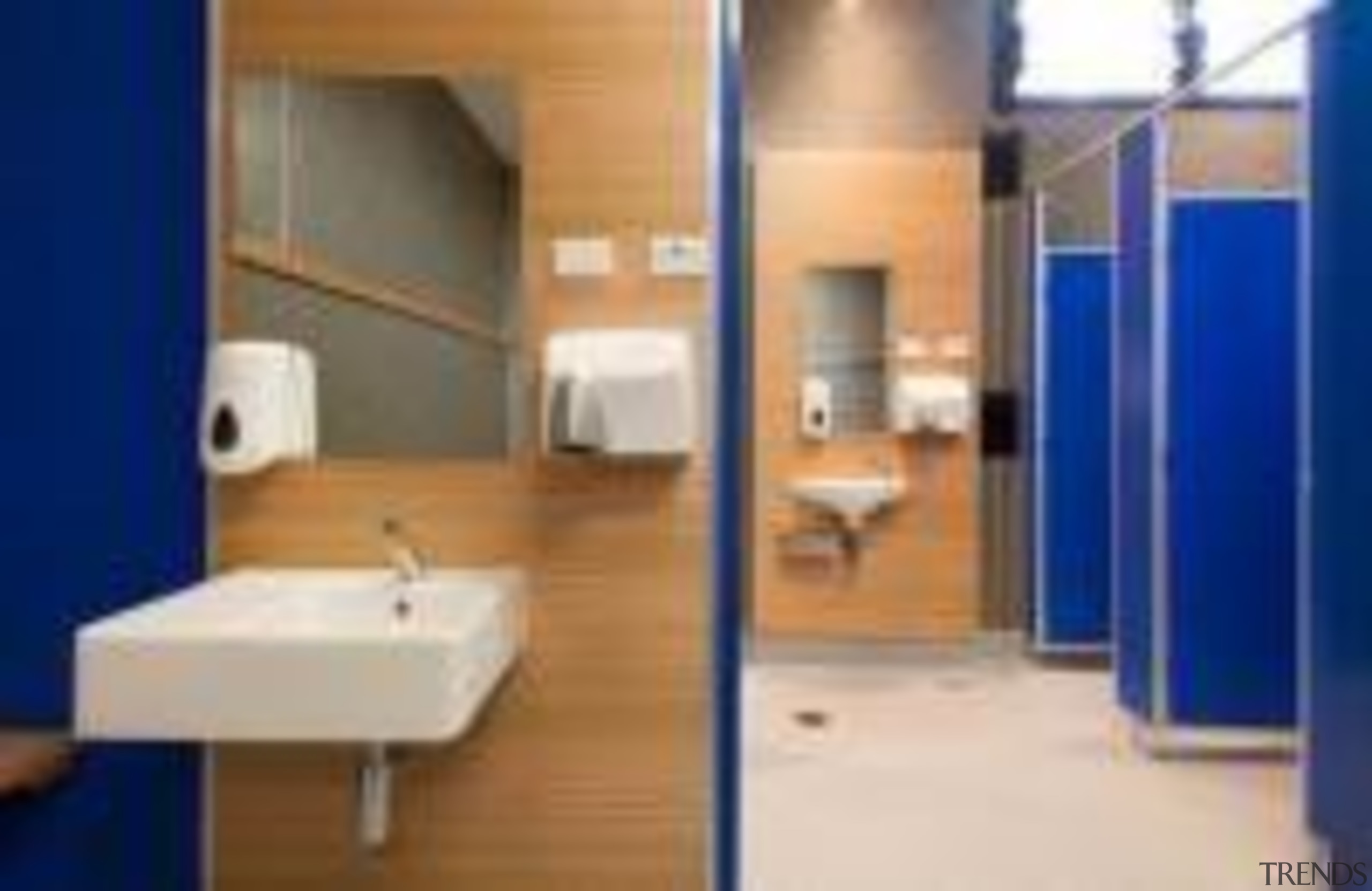Changing room at St Mary's College Designed by bathroom, floor, interior design, real estate, room, blue, gray