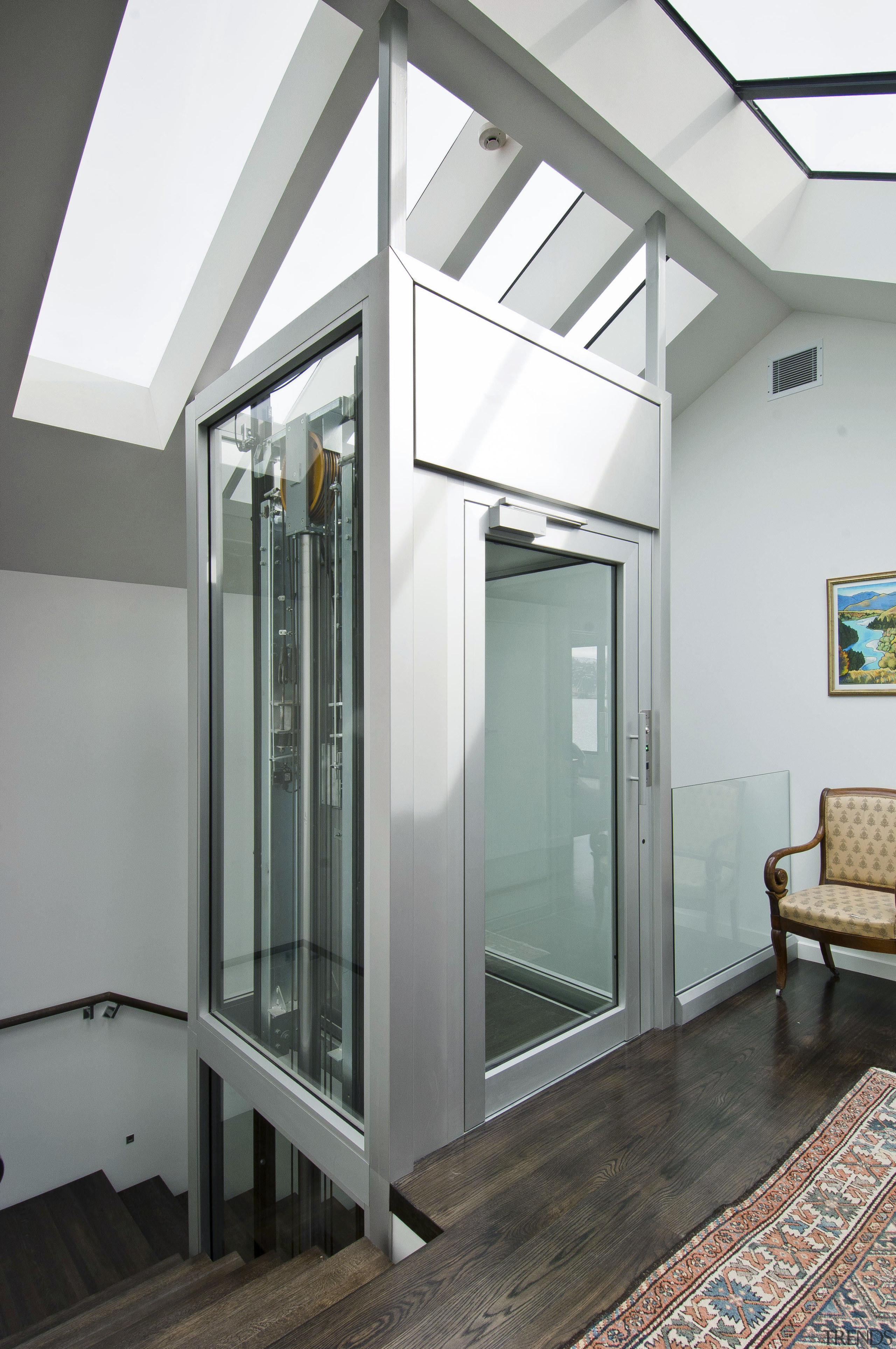 This house was designed by Gina Jones of daylighting, door, glass, window, gray, white