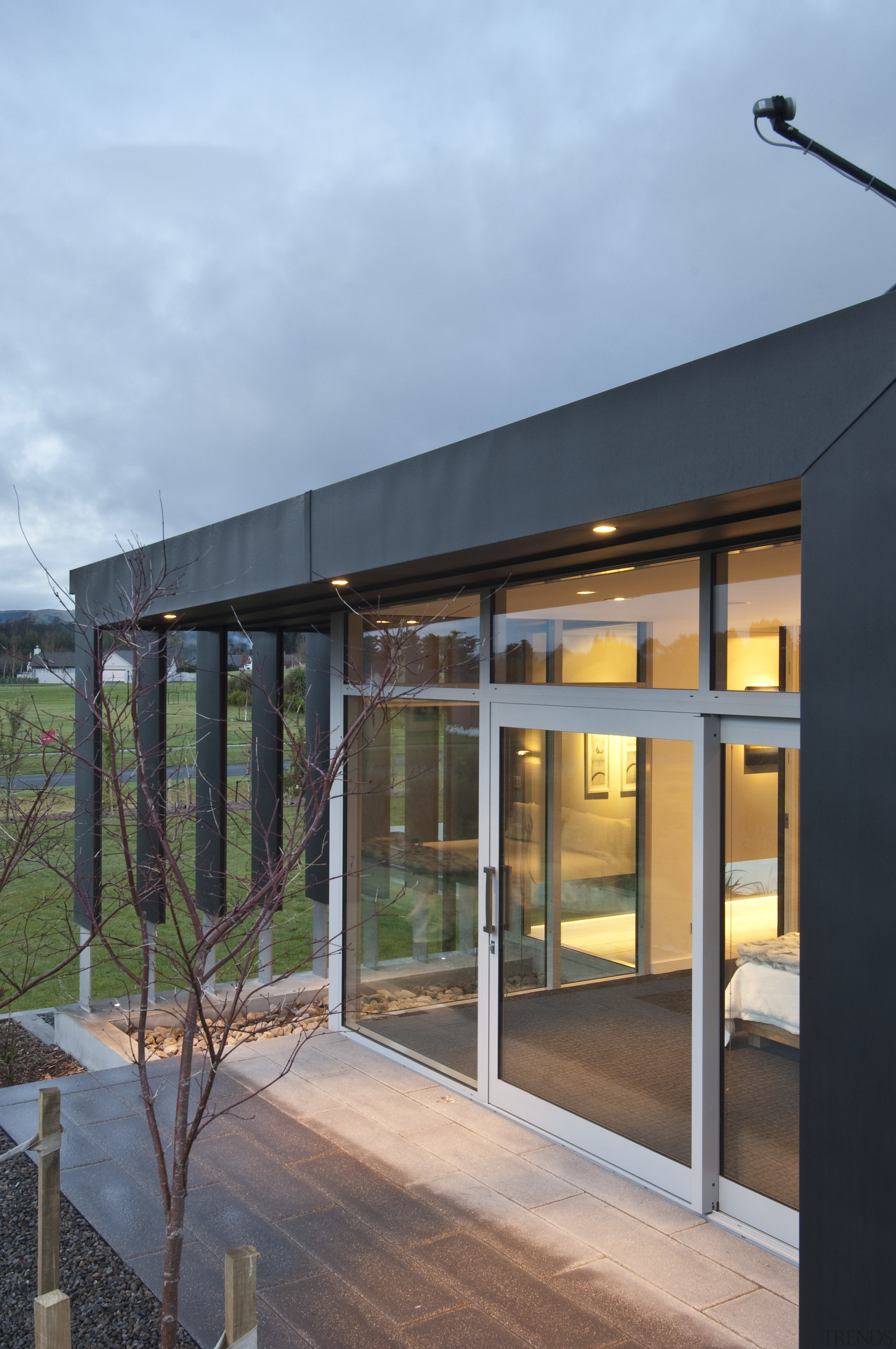 View of contemporary bach with terrace, sheltered courtyard architecture, facade, home, house, real estate, roof, window, teal