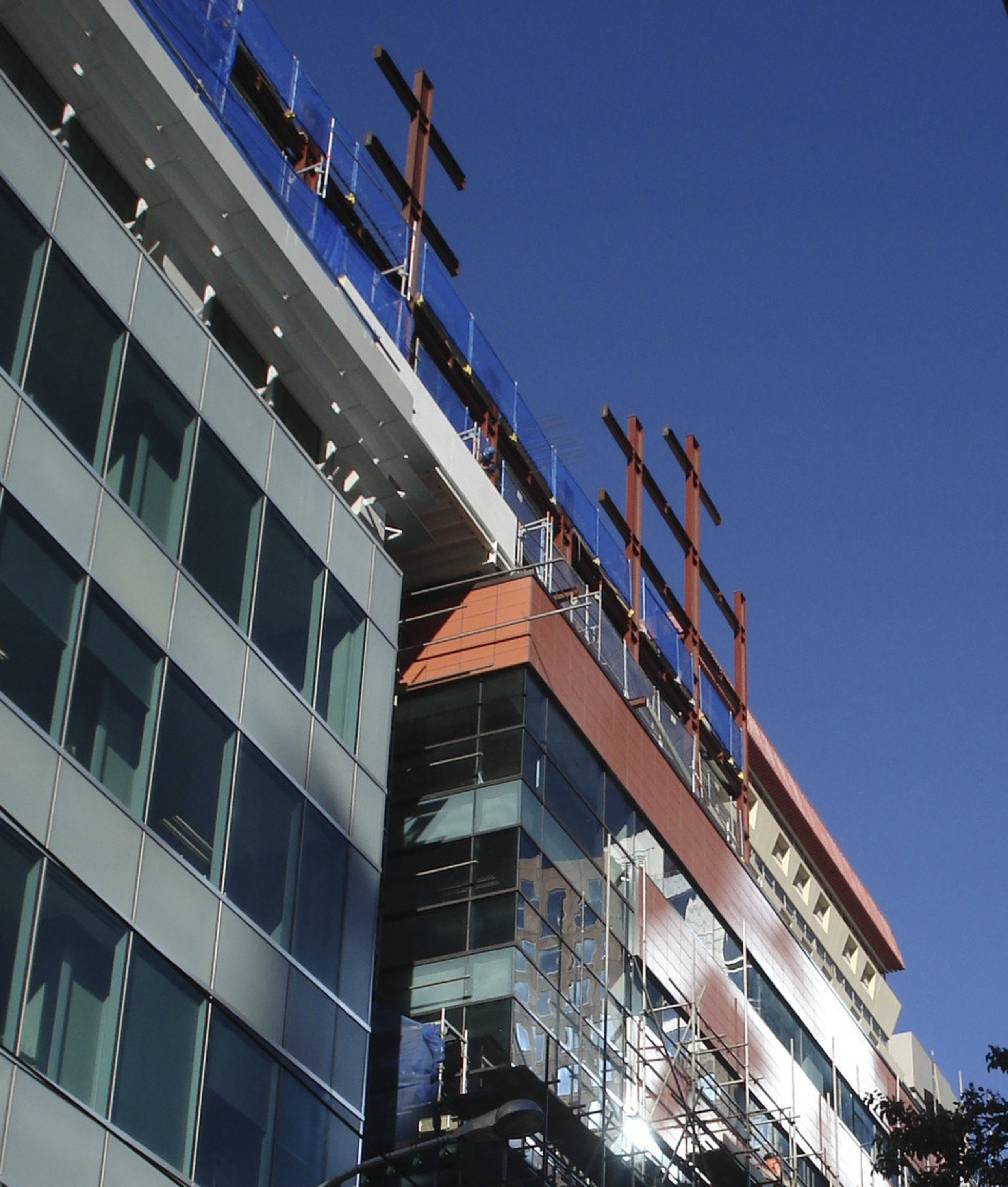 View of the construction process of Chews Lane architecture, building, city, condominium, corporate headquarters, facade, metropolis, metropolitan area, sky, urban area, blue, black