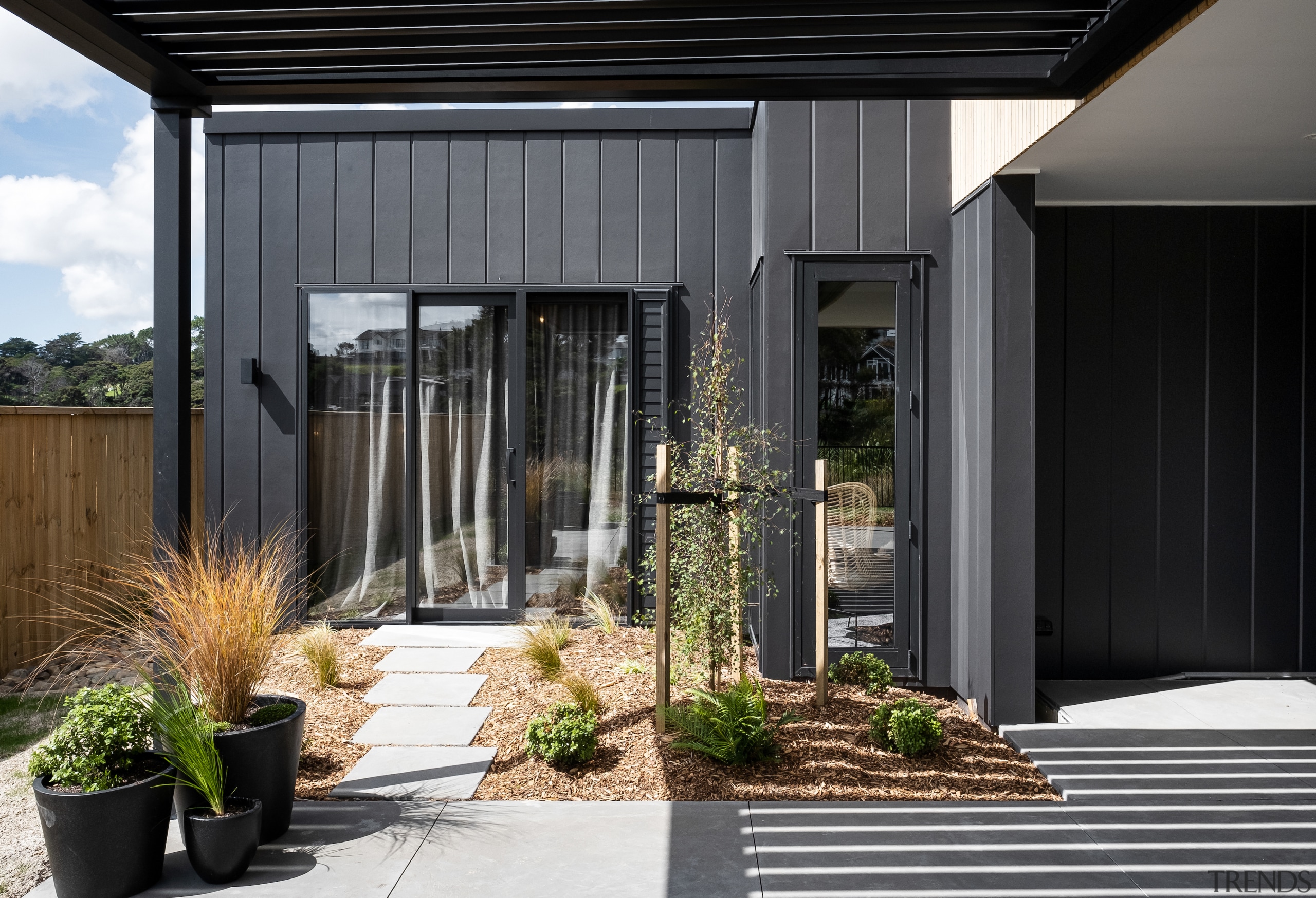 A bedroom is straight ahead with the narrow 