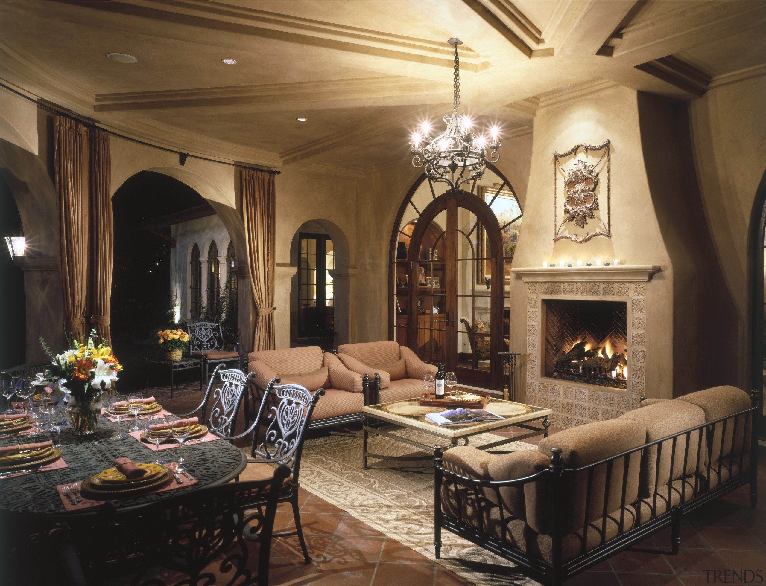 A view of the living area featuring covered ceiling, dining room, estate, hearth, home, interior design, living room, property, real estate, room, black, brown
