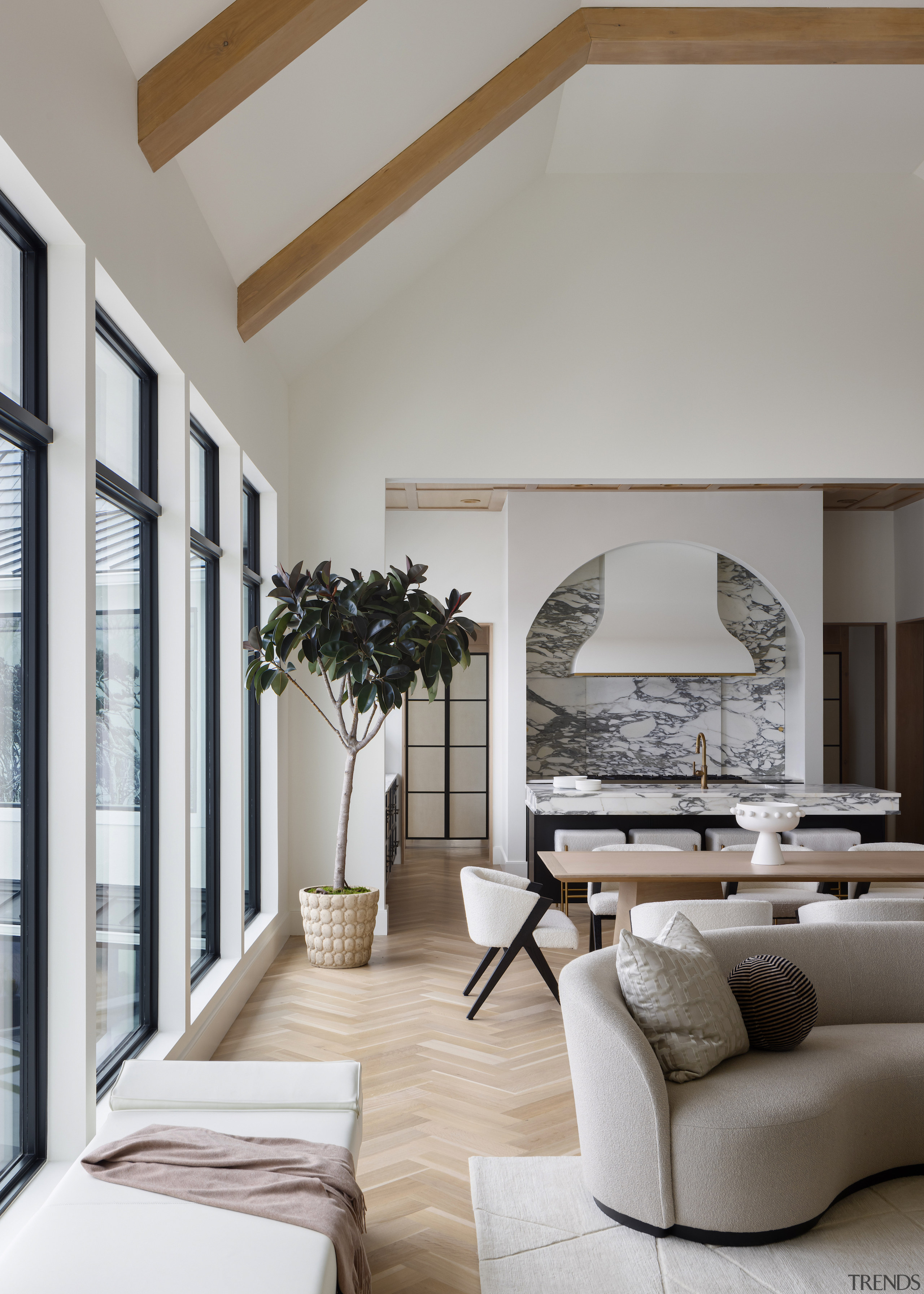 Herringbone wood floors in the wider living spaces 