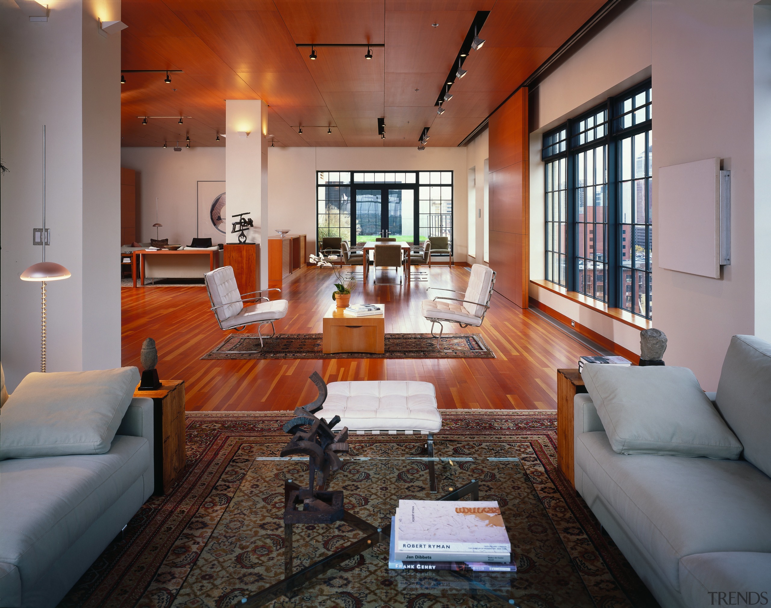 View of a living area, wooden floor an interior design, living room, real estate, room, table, gray, red