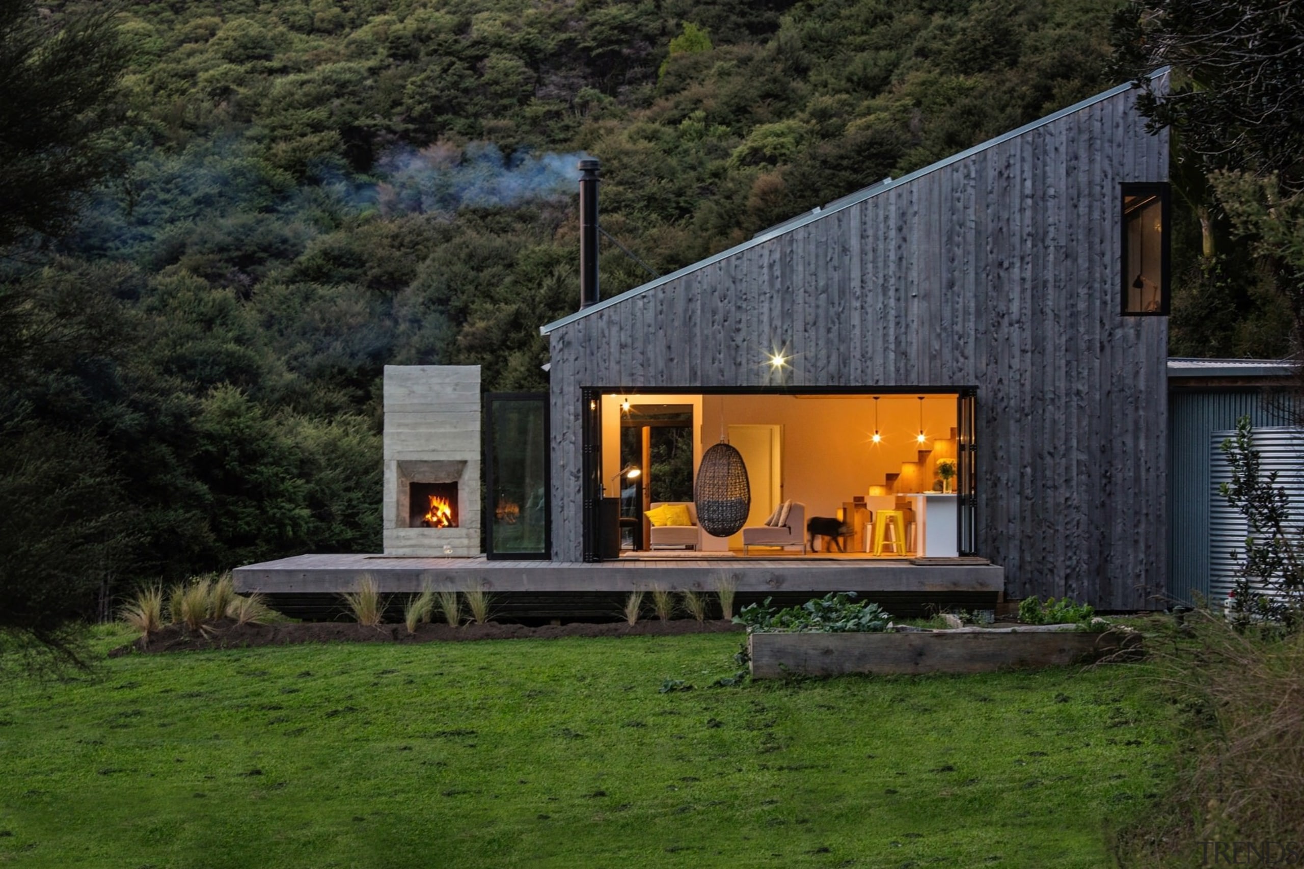 It's the perfect bush retreat - It's the architecture, cottage, facade, farmhouse, home, house, landscape, real estate, black, brown