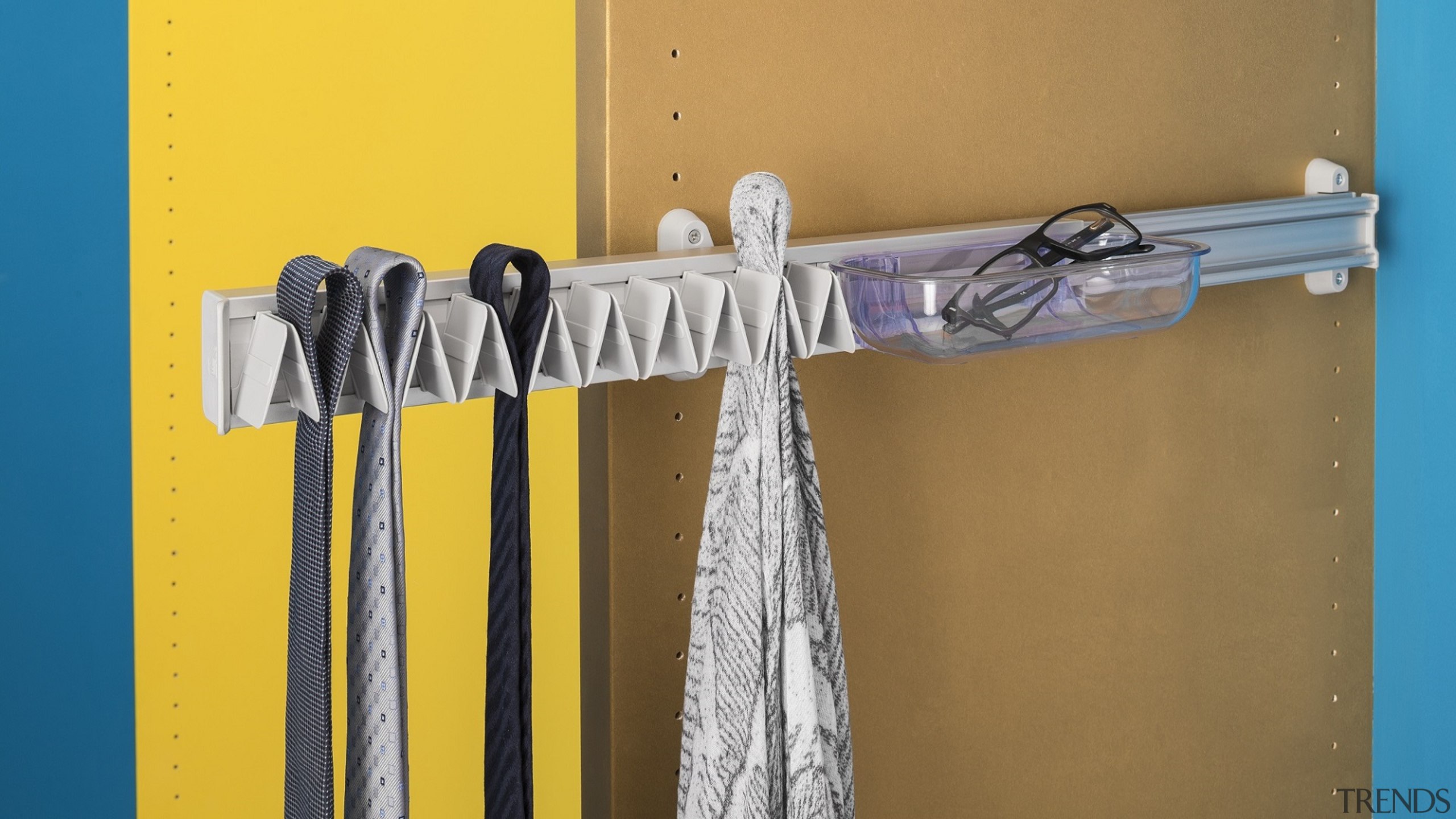 Ambos tie hangers are available in Fixed andPull clothes hanger, yellow, brown, orange